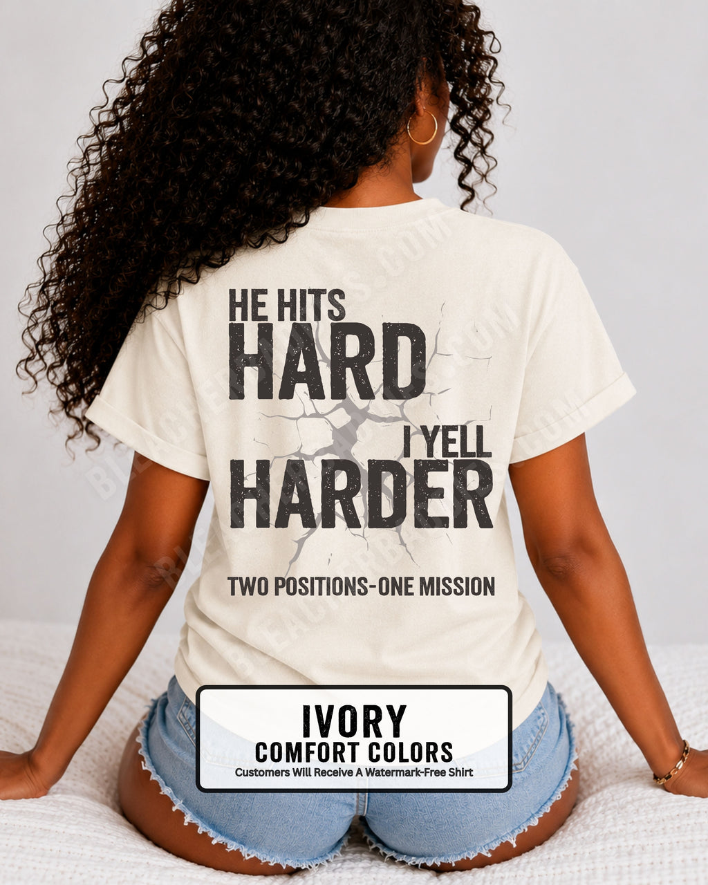 Back view of an ivory Comfort Colors t-shirt featuring the distressed "He Hits Hard I Yell Harder" football design with "Two Positions One Mission" printed across the lower back. Football mom shirt.