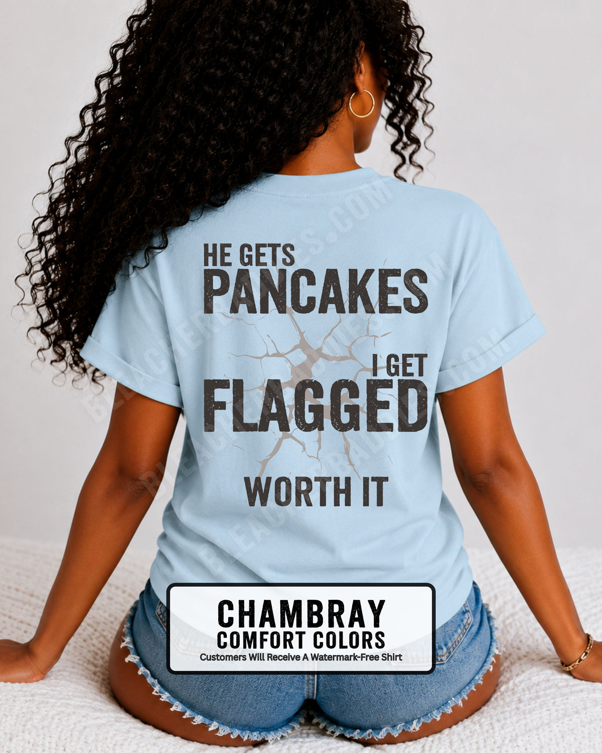 Football mom game day comfort colors t- shirt in chambray blue with back design that reads “He gets pancakes I get flagged worth it” in distressed black text with cracked graphic