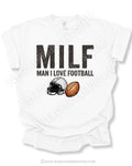 White comfort colors t-shirt flat lay that says “MILF Man I Love Football” with football helmet and ball graphic