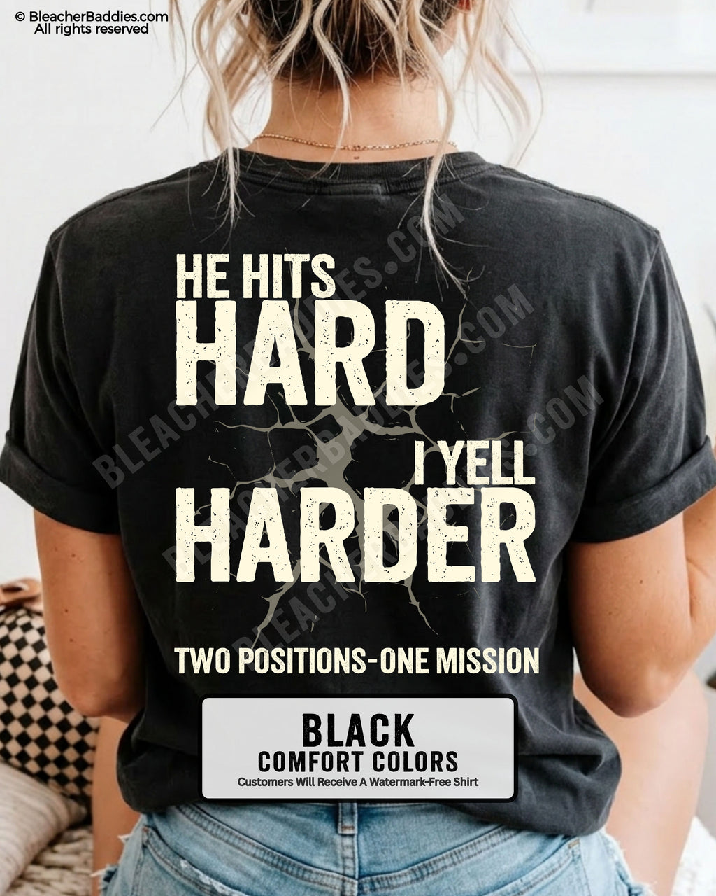 Back view of a black Comfort Colors t-shirt featuring the distressed "He Hits Hard I Yell Harder" football design with "Two Positions One Mission" printed across the lower back.