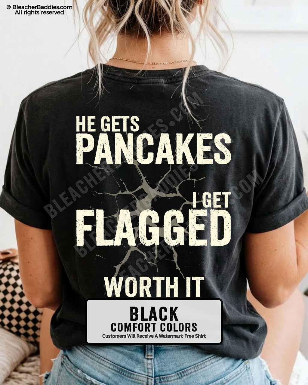 Football mom game day comfort colors shirt in black with back design that reads “He gets pancakes I get flagged worth it” in distressed cream text with cracked graphic