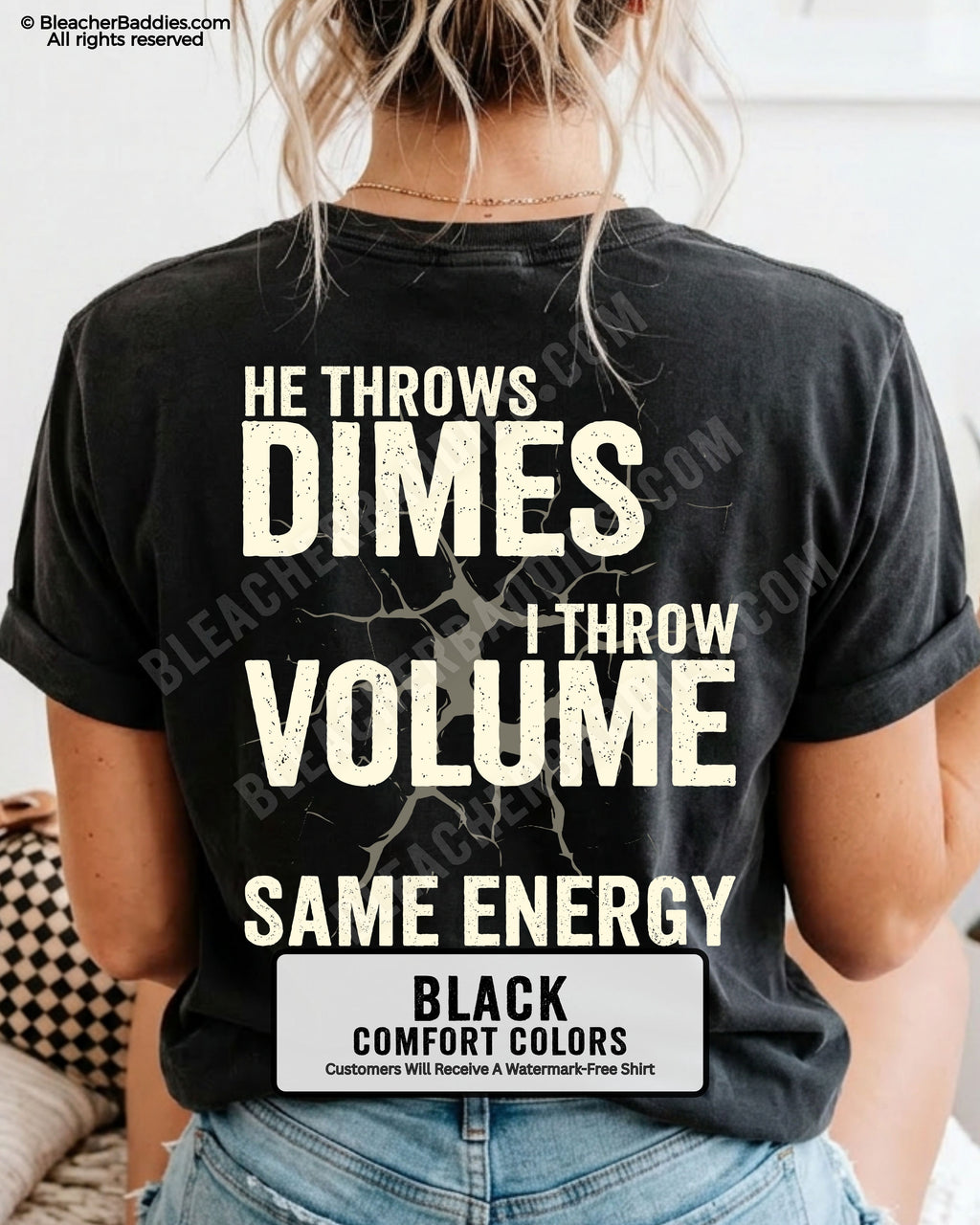 Back view of woman wearing black Comfort Colors t-shirt mockup showing large distressed text “He Throws Dimes I Throw Volume Same Energy” centered on the back design