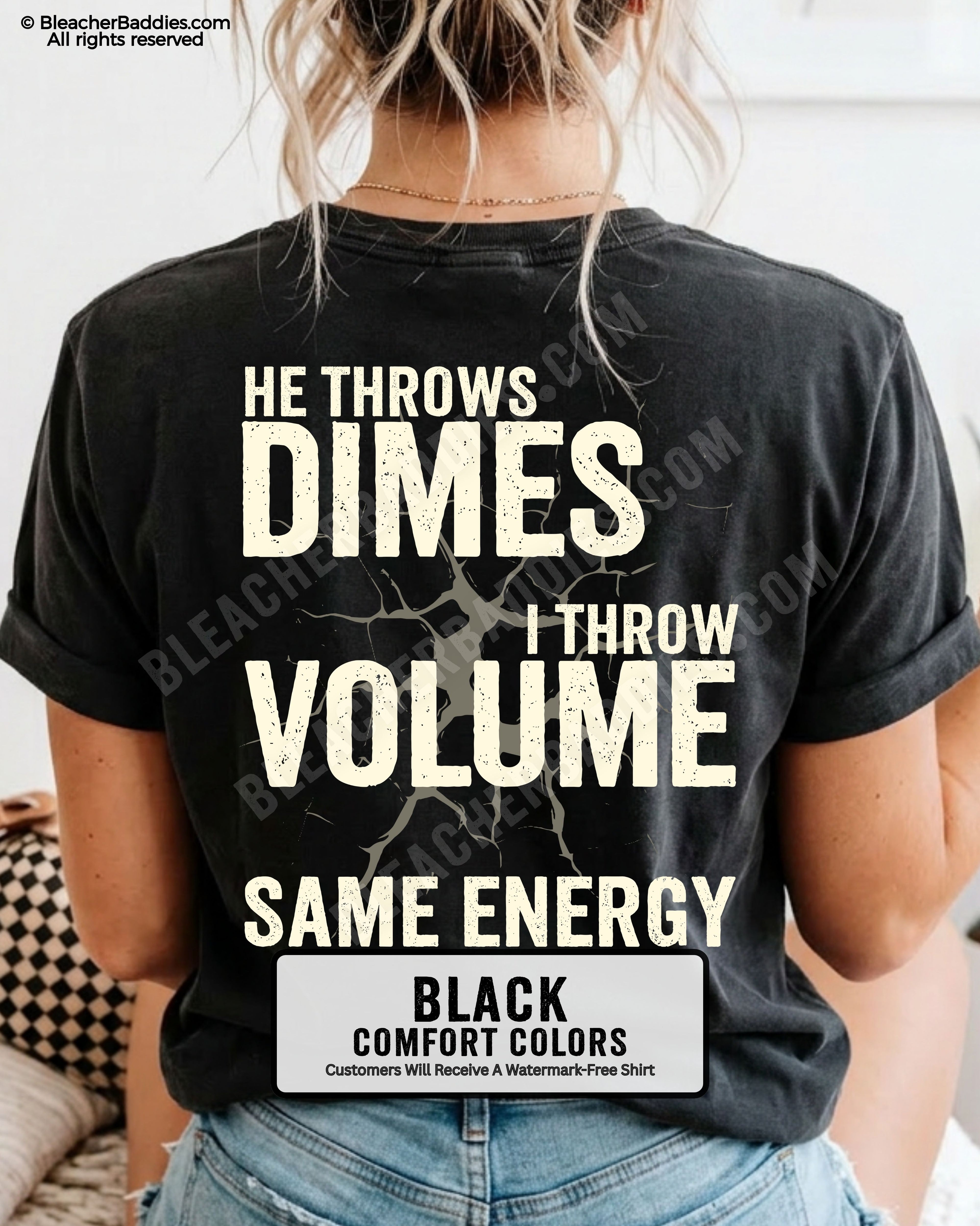 Back view of woman wearing black Comfort Colors t-shirt mockup showing large distressed text “He Throws Dimes I Throw Volume Same Energy” centered on the back design