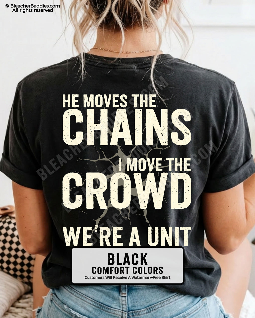 Back view of woman wearing BLACK Comfort Colors football mom game day shirt featuring “He Moves the Chains I Move the Crowd We’re a Unit” bold graphic design