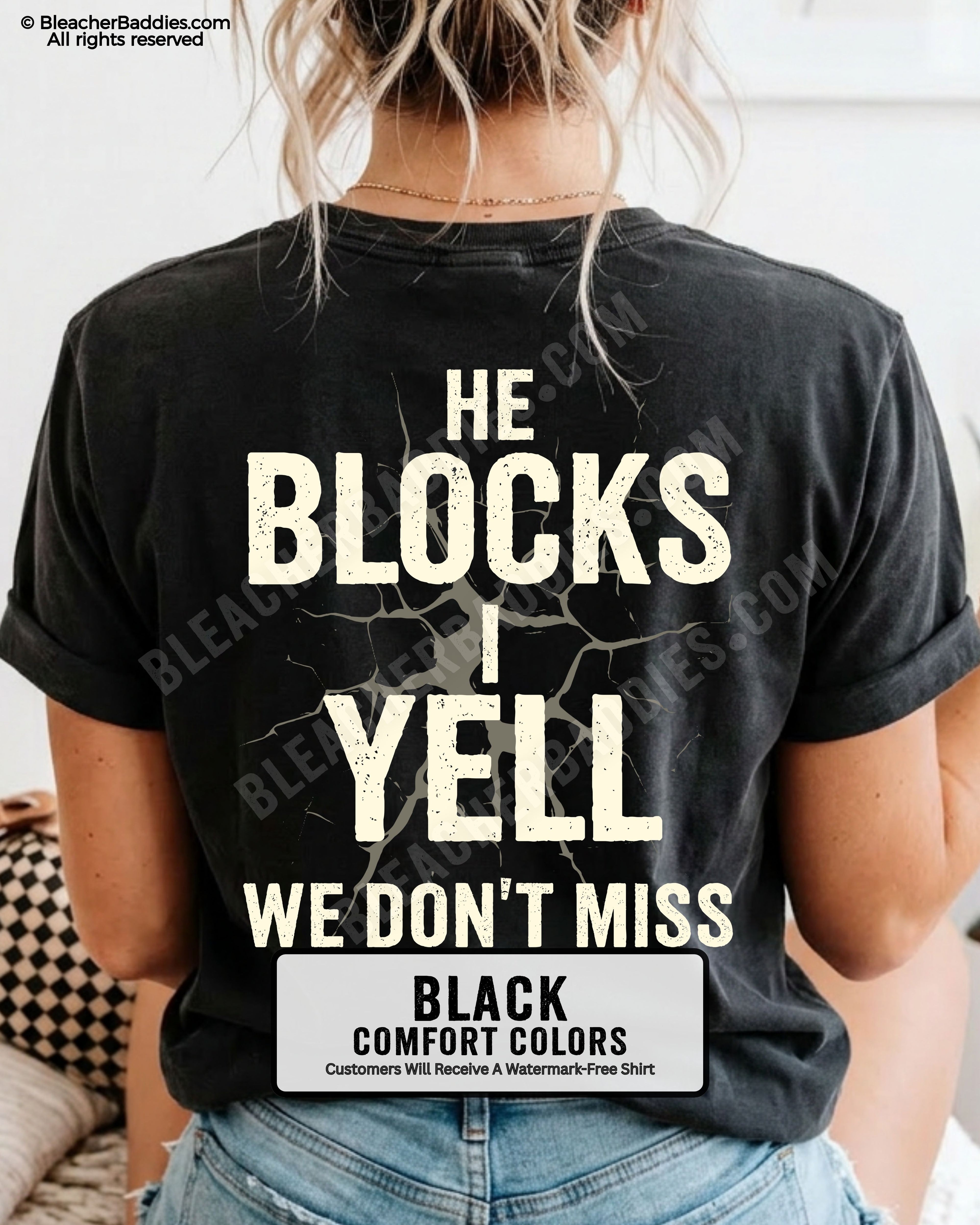 Woman wearing BLACK Comfort Colors football mom game day shirt with back design that reads “He blocks I yell we don’t miss” in distressed CREAM text with cracked graphic and ivory color label shown
