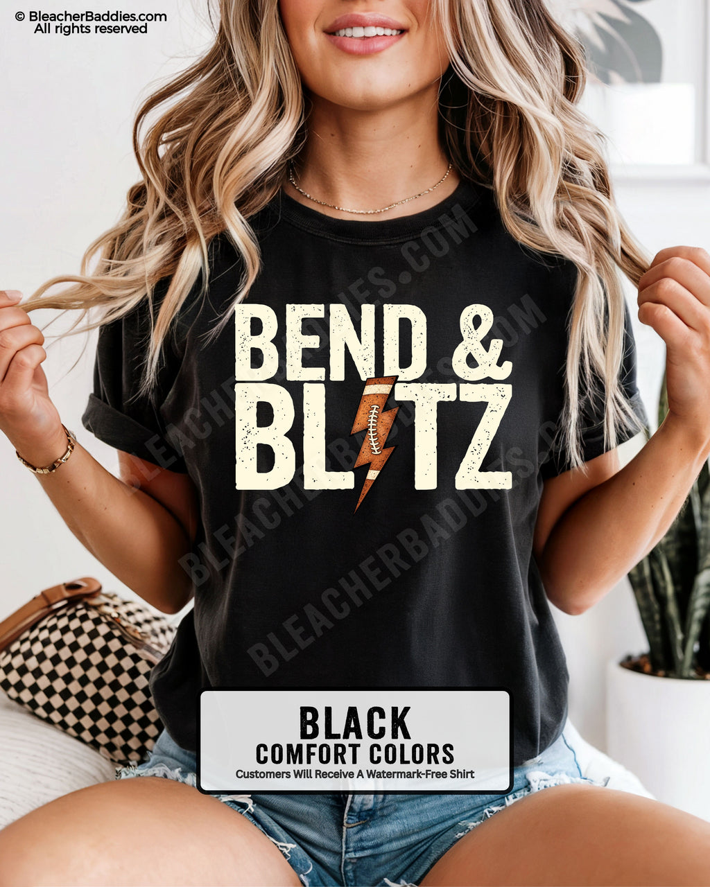 Front view of a black Comfort Colors t-shirt featuring the phrase "Bend & Blitz" in bold distressed lettering with a textured football lightning bolt graphic replacing the letter "I" for a trendy football game day design.