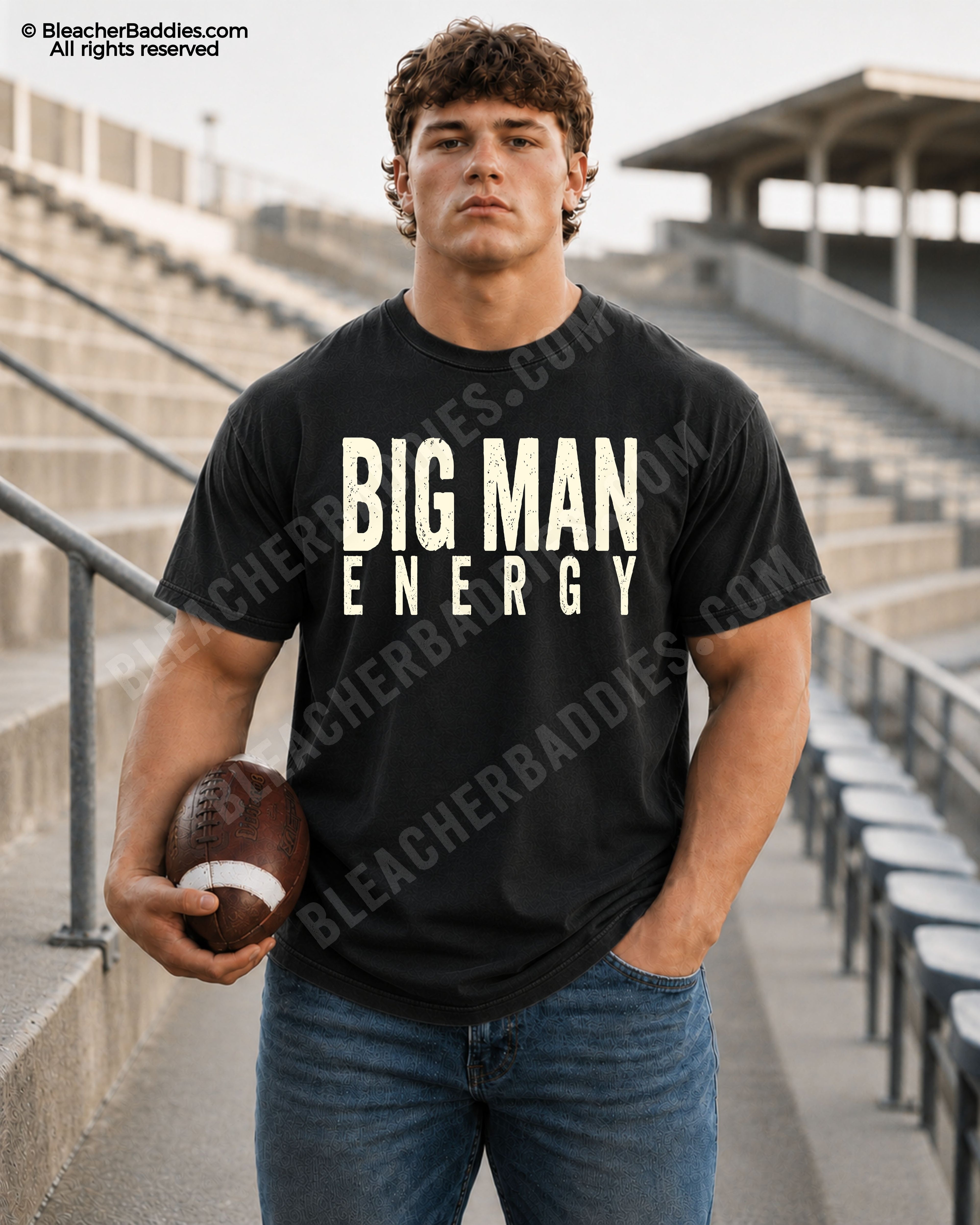 Male football player standing in stadium wearing a black Comfort Colors Big Man Energy football shirt with distressed cream typography. 