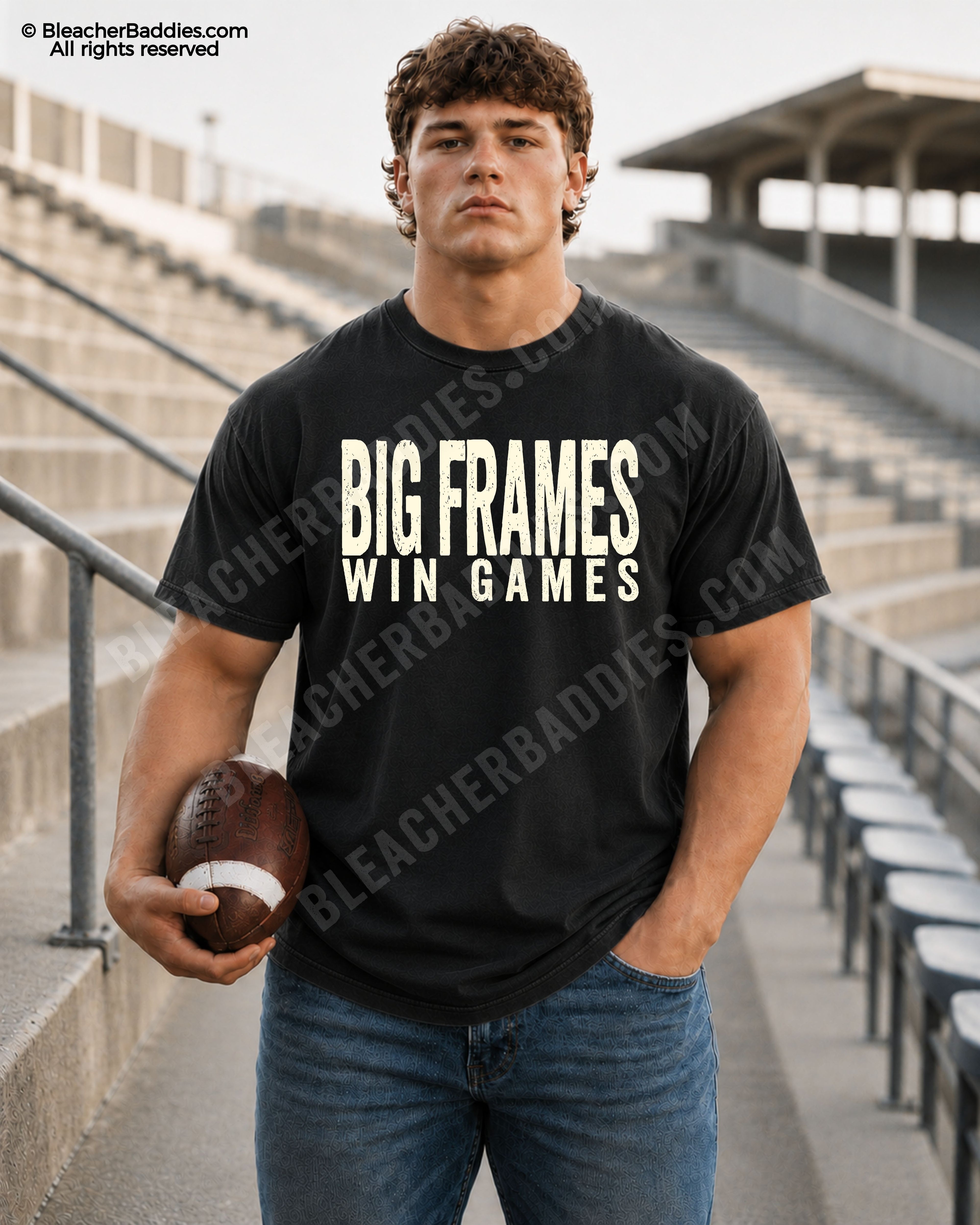 Football player standing in stadium wearing a BLACK Comfort Colors “Big Frames Win Games” game day shirt with distressed CREAM lettering and football aesthetic.