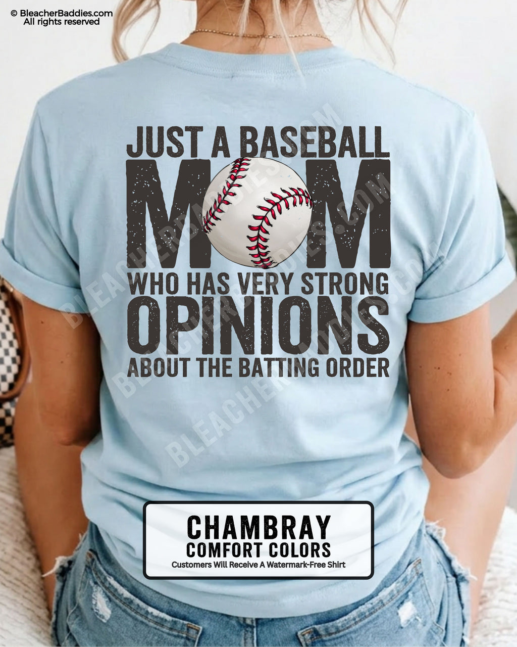 Chambray Comfort Colors game day shirt worn by woman showing distressed back graphic reading “Just a Baseball Mom Who Has Very Strong Opinions About The Batting Order” with baseball illustration over MOM text