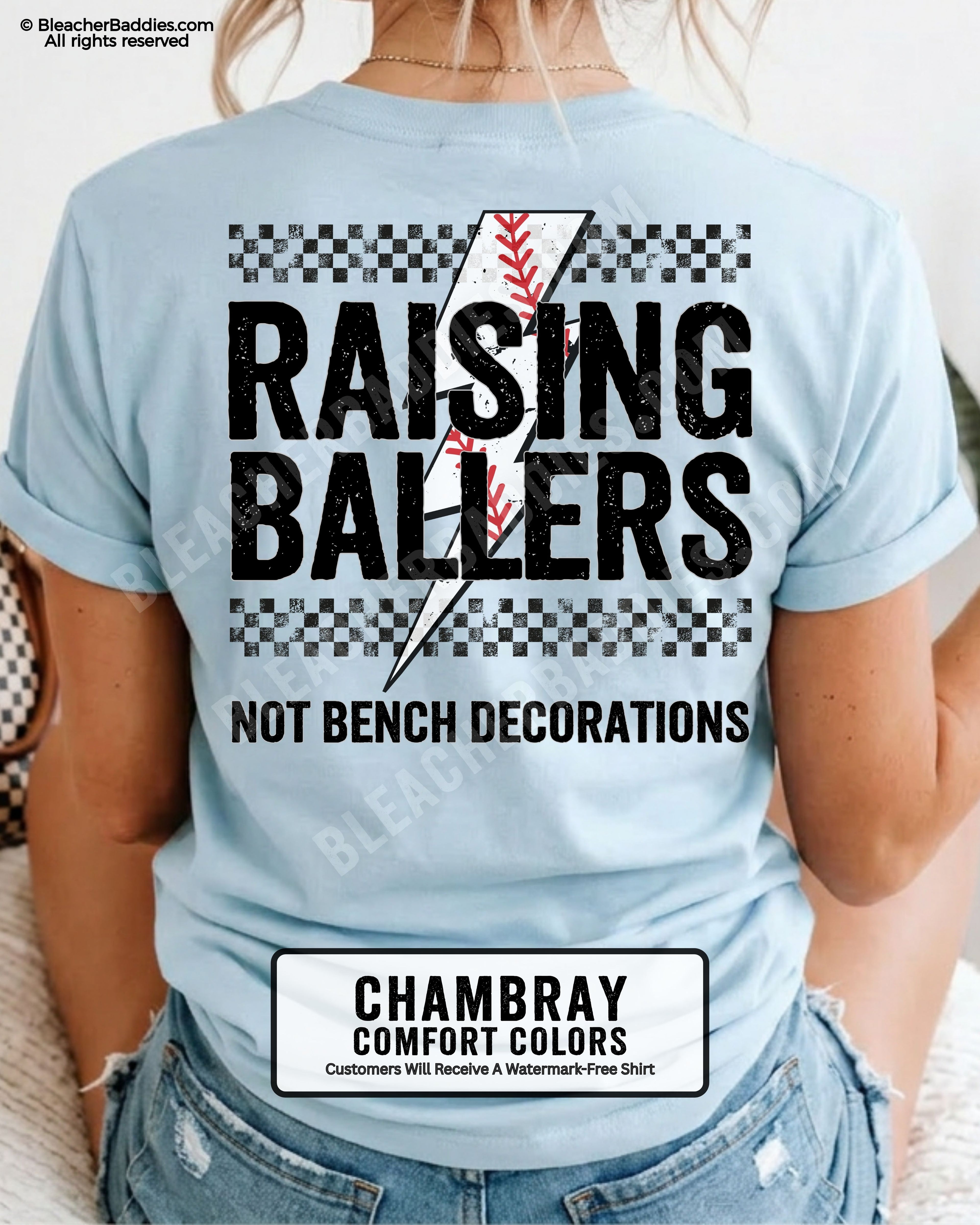 Chambray Comfort Colors shirt with distressed Raising Ballers baseball graphic featuring checkerboard stripes, red baseball stitching, and “Not Bench Decorations” slogan across the back.