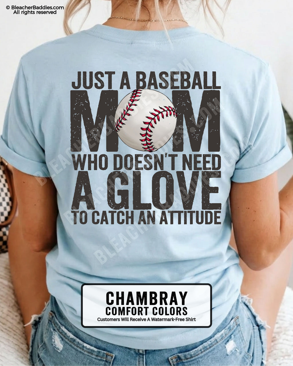 Chambray Comfort Colors game day shirt worn by woman showing distressed back graphic reading “Just a Baseball Mom Who Doesn’t Need A Glove To Catch An Attitude” with baseball illustration layered over MOM text