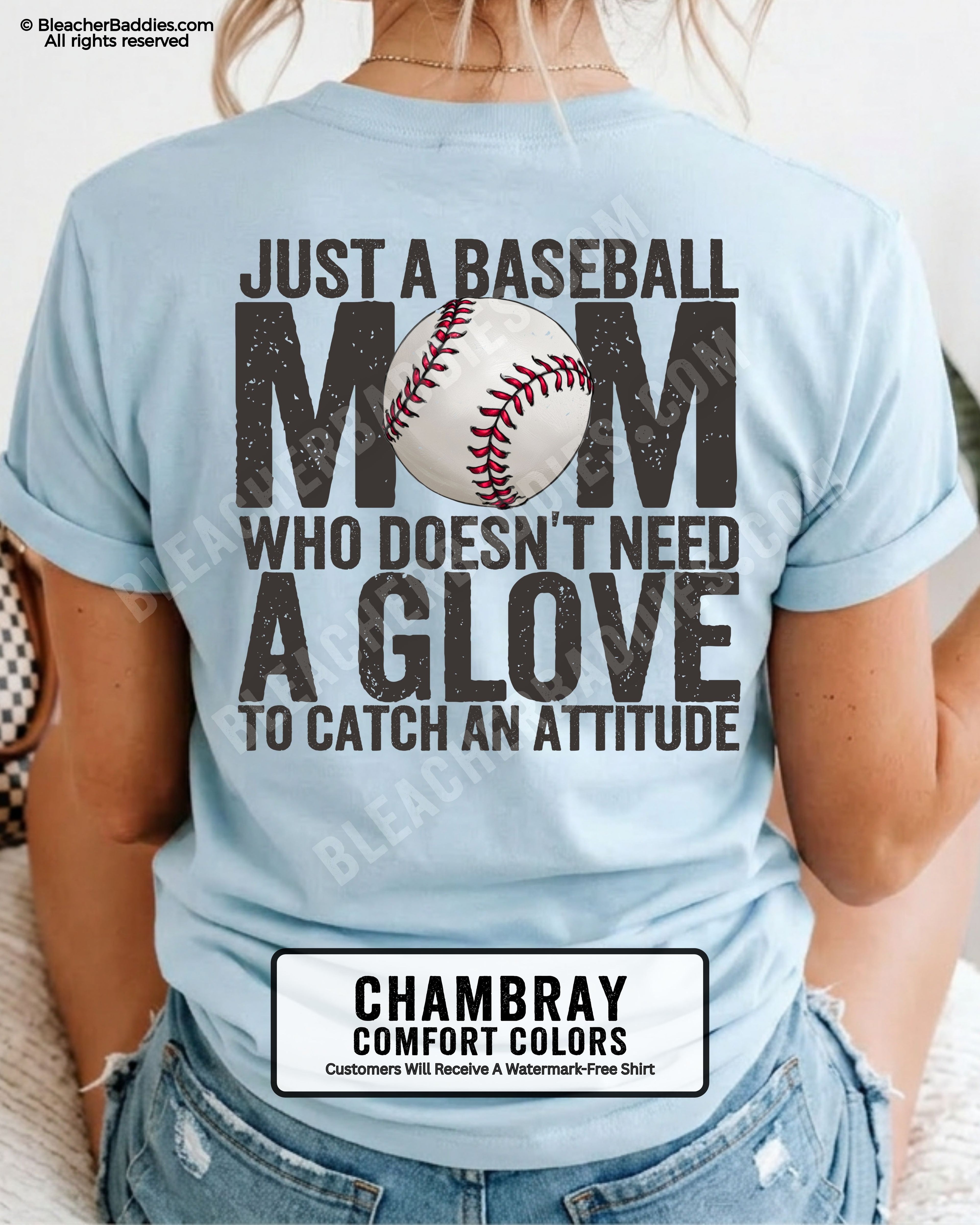 Chambray Comfort Colors game day shirt worn by woman showing distressed back graphic reading “Just a Baseball Mom Who Doesn’t Need A Glove To Catch An Attitude” with baseball illustration layered over MOM text