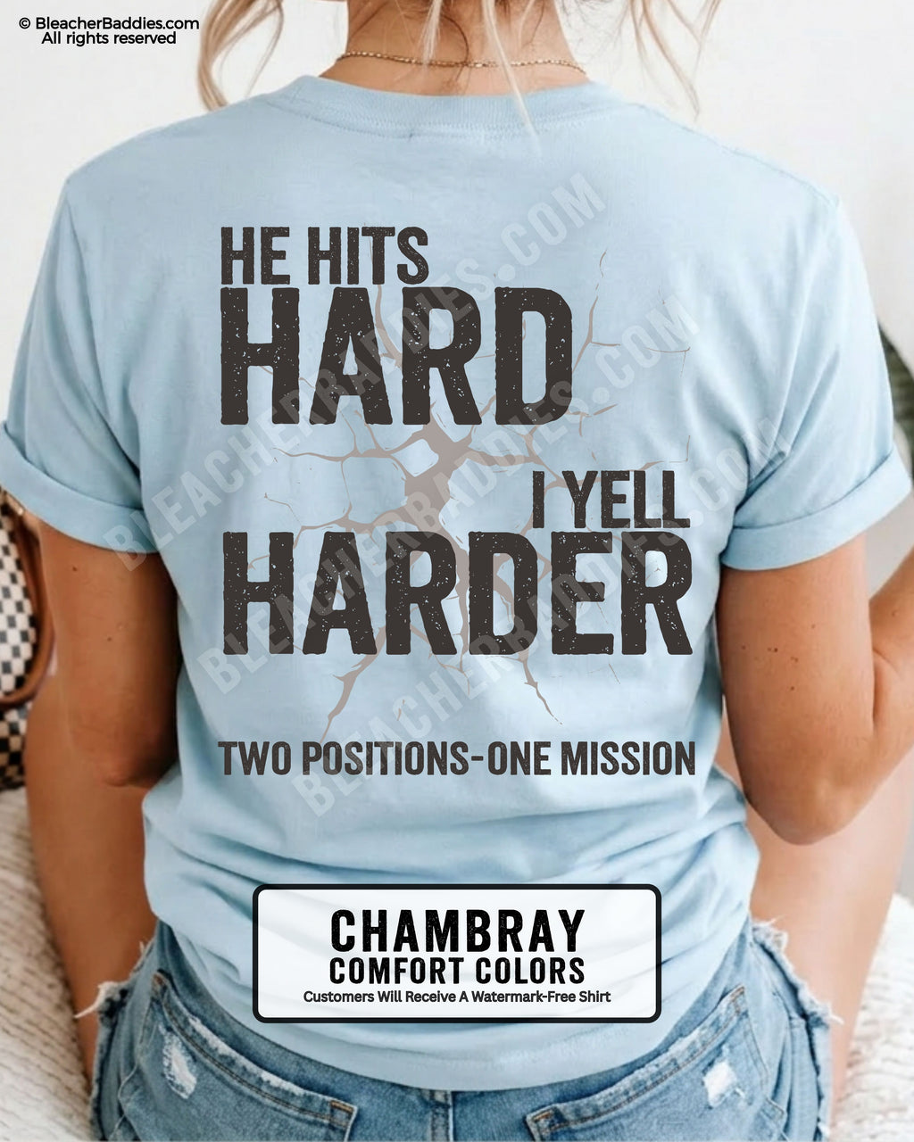 Back view of a chambray Comfort Colors t-shirt featuring the distressed "He Hits Hard I Yell Harder" football design with "Two Positions One Mission" printed across the lower back.
