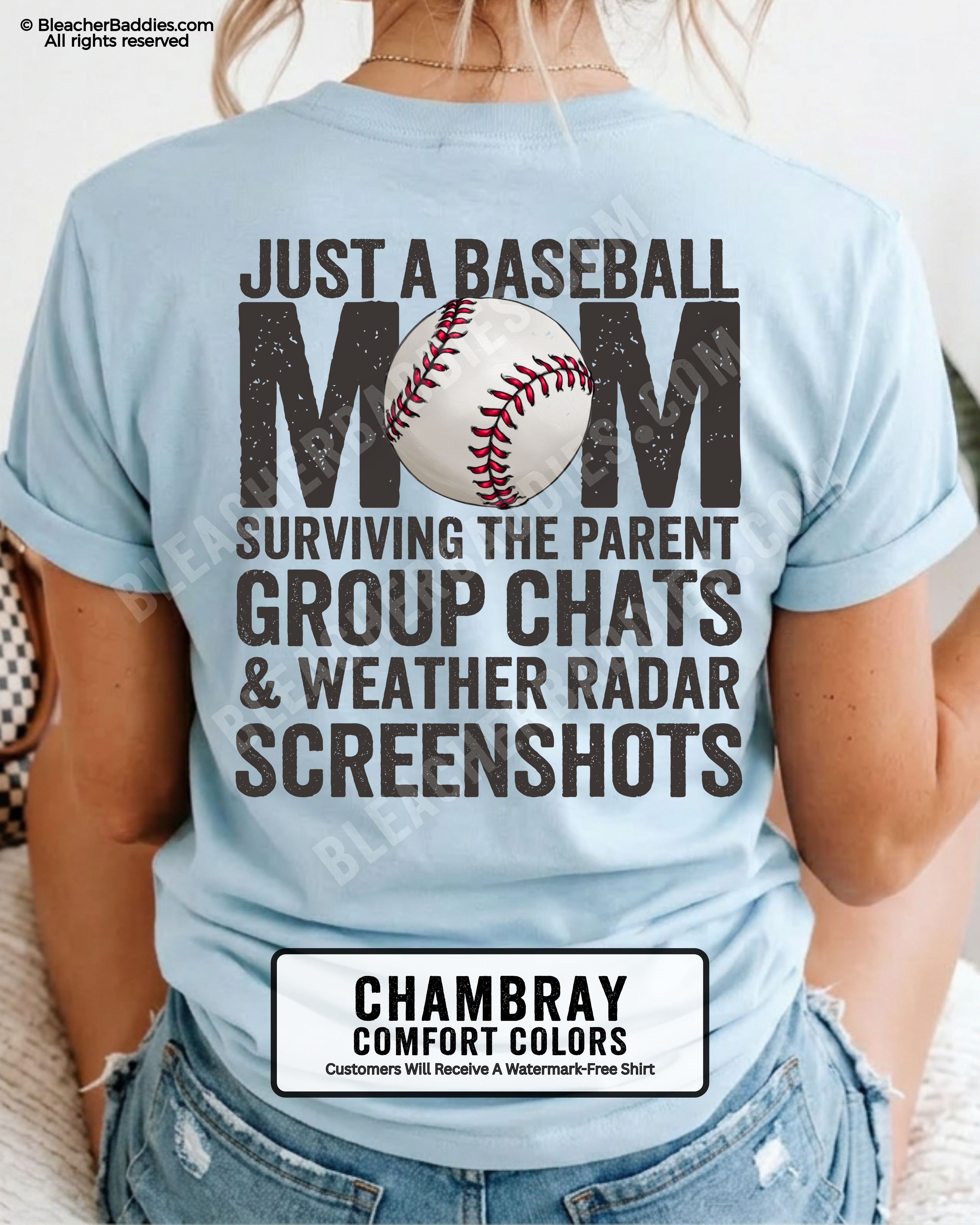 Chambray Comfort Colors game day shirt worn by woman showing distressed back graphic reading “Just a Baseball Mom Surviving the Parent Group Chats & Weather Radar Screenshots” with baseball illustration over MOM text