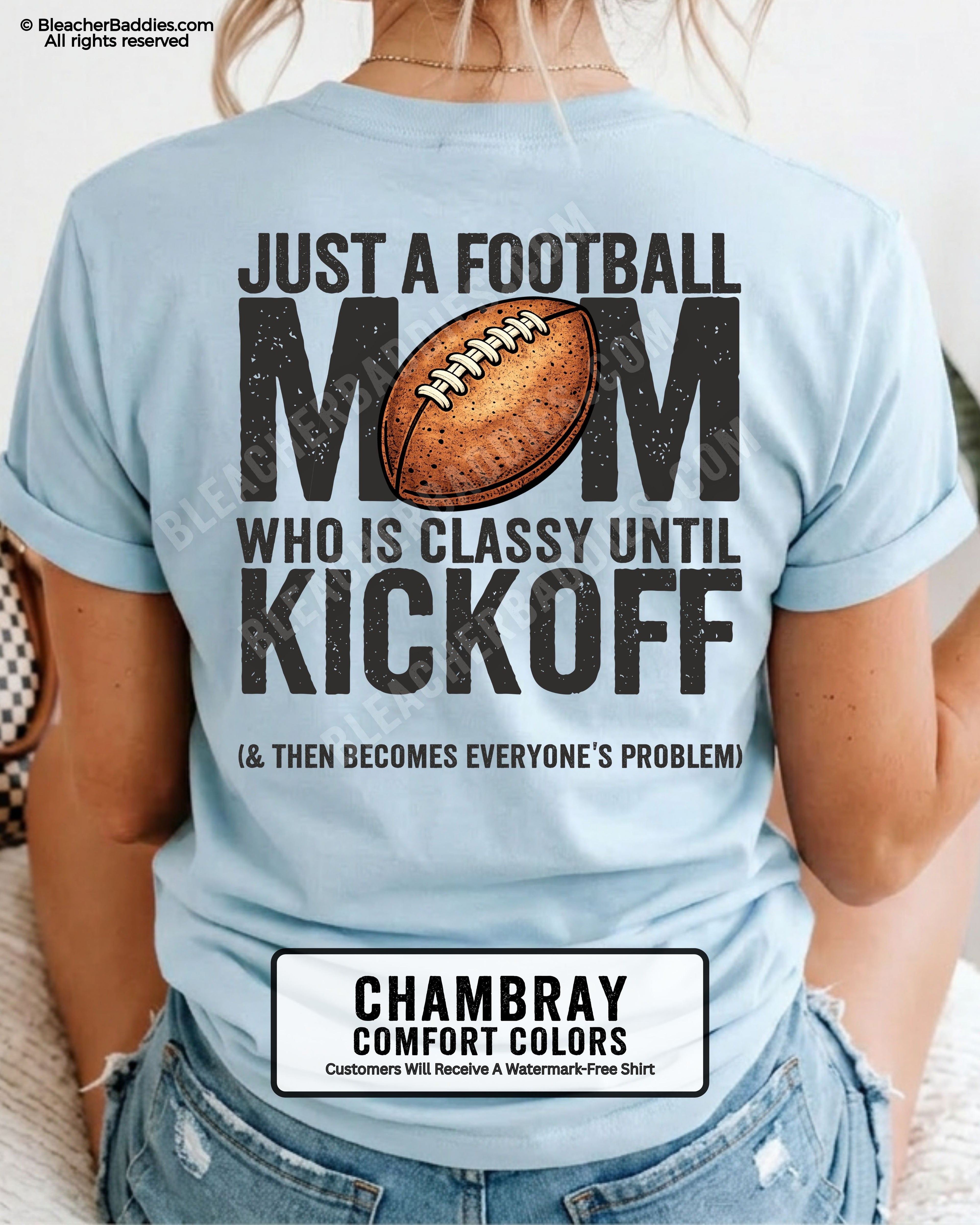 Chambray blue Comfort Colors t-shirt shown from back featuring oversized text “Just a Football Mom Who Is Classy Until Kickoff (& Then Becomes Everyone’s Problem)” with football design