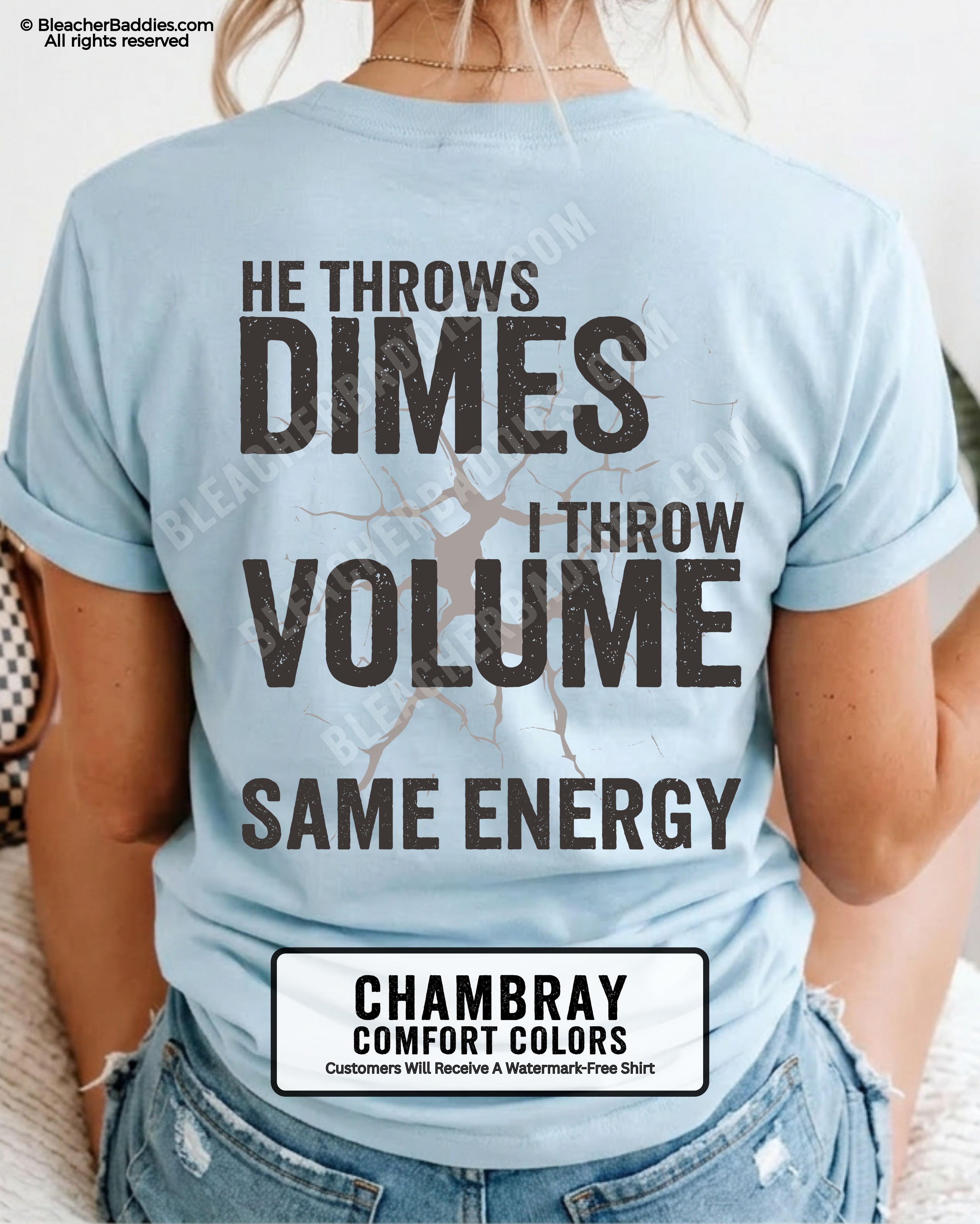 Back view of woman wearing chambray Comfort Colors t-shirt mockup showing large distressed text “He Throws Dimes I Throw Volume Same Energy” centered on the back design