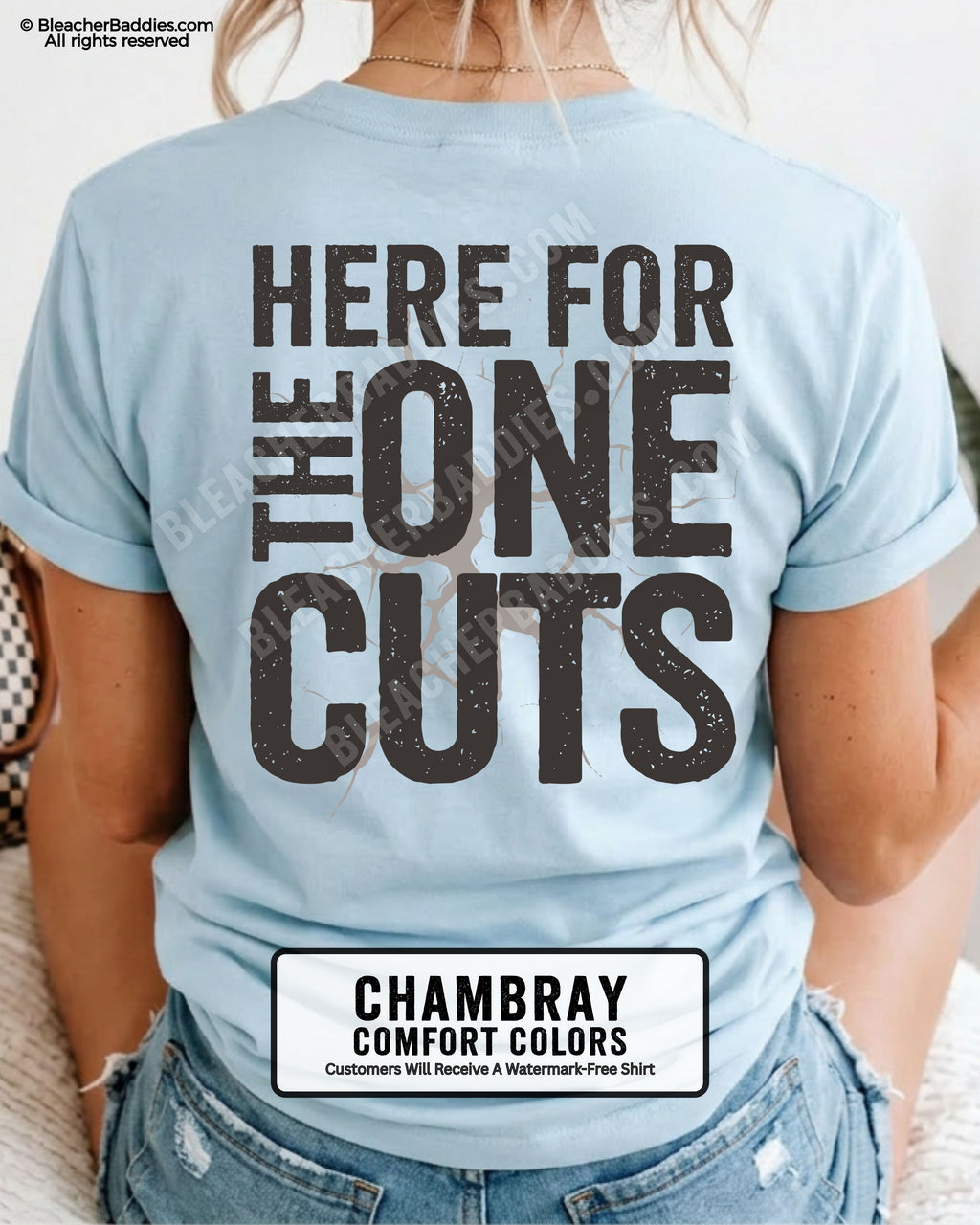 close-up back view of chambray comfort colors football mom game day shirt with “here for the one cuts” design printed on the back