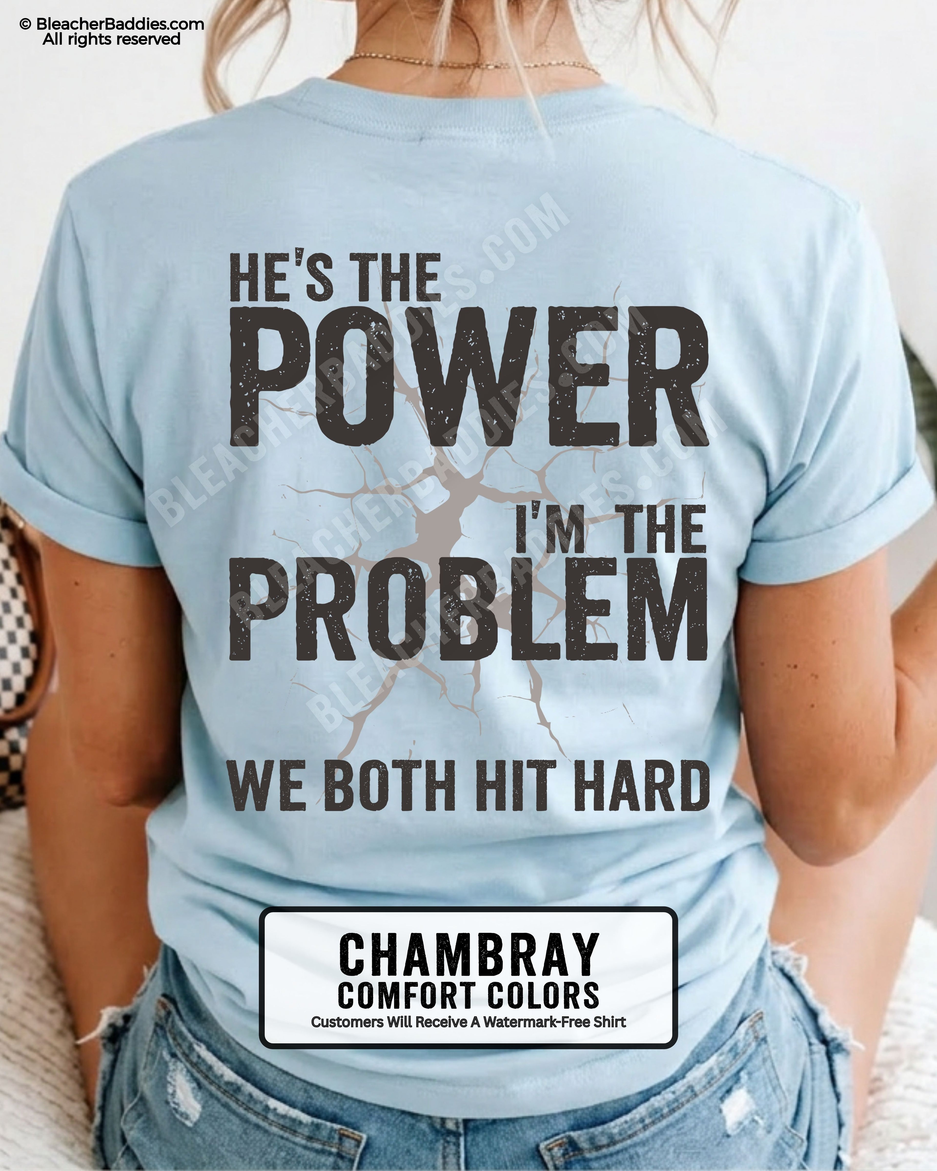 Back view of chambray blue Comfort Colors football mom game day shirt reading “He’s the Power I’m the Problem We Both Hit Hard,” close-up fit on woman wearing denim shorts