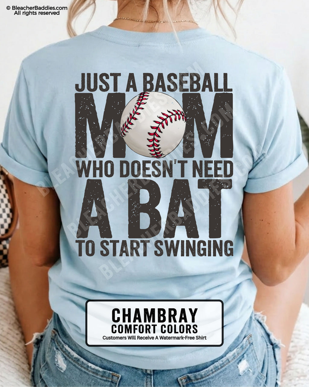 Chambray Comfort Colors game day shirt worn by woman showing distressed back graphic reading “Just a Baseball Mom Who Doesn’t Need A Bat To Start Swinging” with baseball illustration layered over MOM text