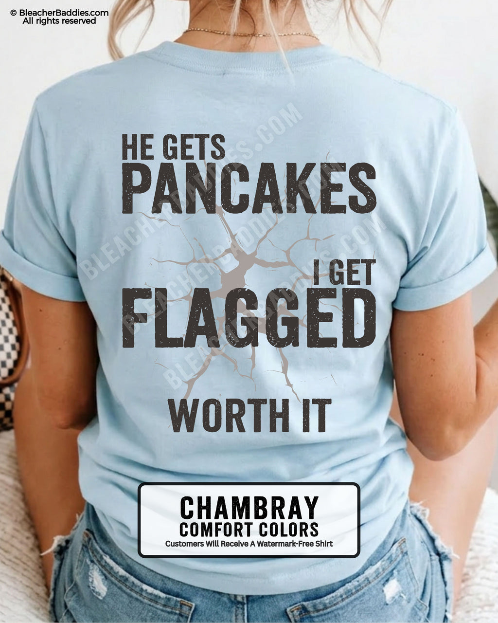 Football mom game day shirt in chambray blue with back design that reads “He gets pancakes I get flagged worth it” in distressed black text with cracked graphic