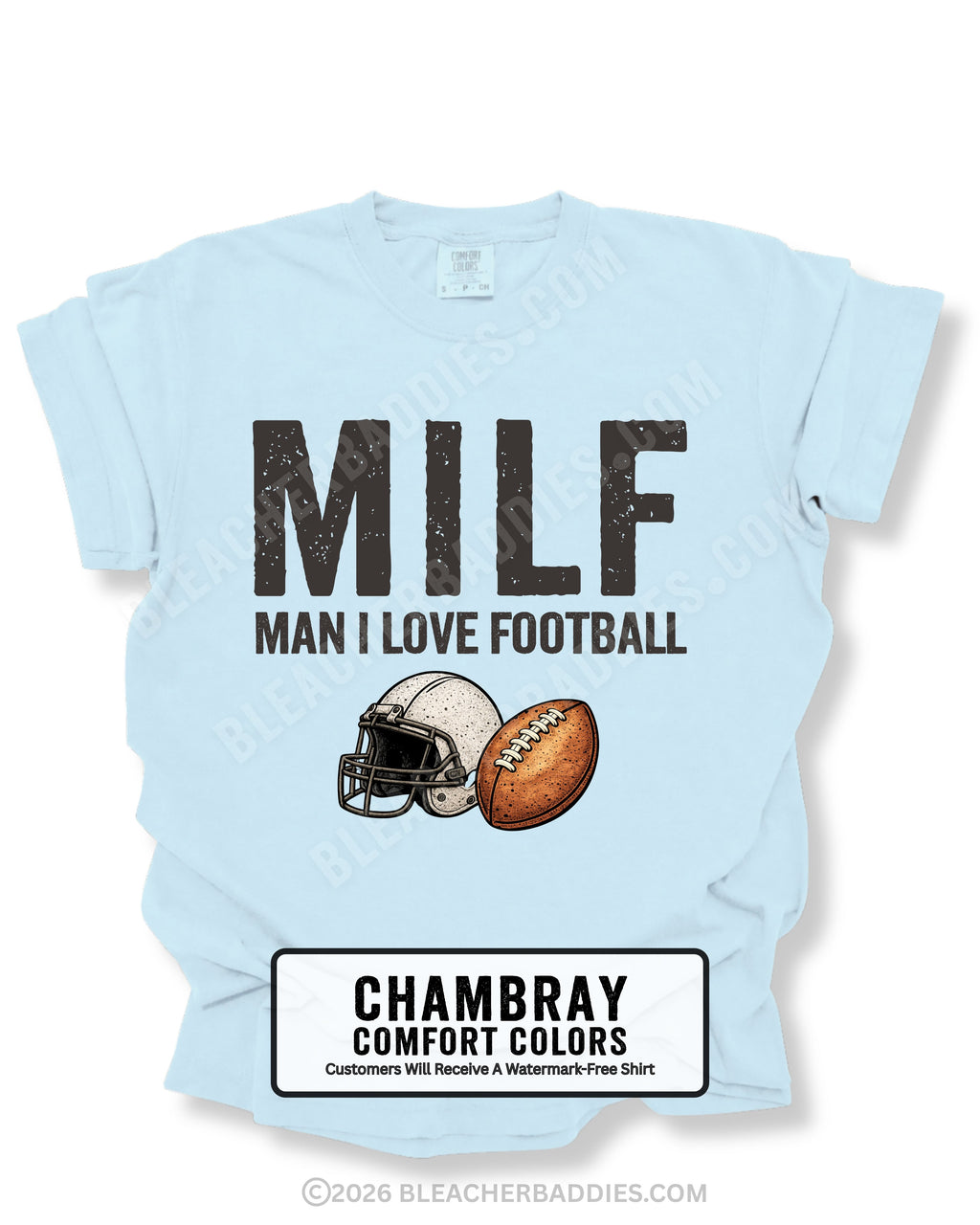 Flat lay of a chambray Comfort Colors t-shirt featuring the distressed ivory text "MILF" with the phrase "MAN I LOVE FOOTBALL" underneath, along with a vintage-style white football helmet and brown football graphic. bold and humorous football fan design perfect for football moms, tailgates, and game day.