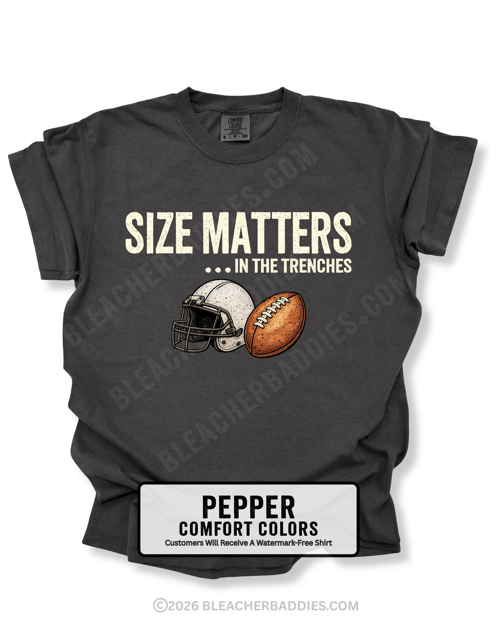 Flat lay mockup of a pepper Comfort Colors t-shirt featuring the funny football saying "Size Matters... In the Trenches" with a vintage football helmet and football graphic. Perfect game day shirt for football fans, offensive linemen, lineman moms, football moms, coaches, players, and anyone who knows games are won in the trenches.