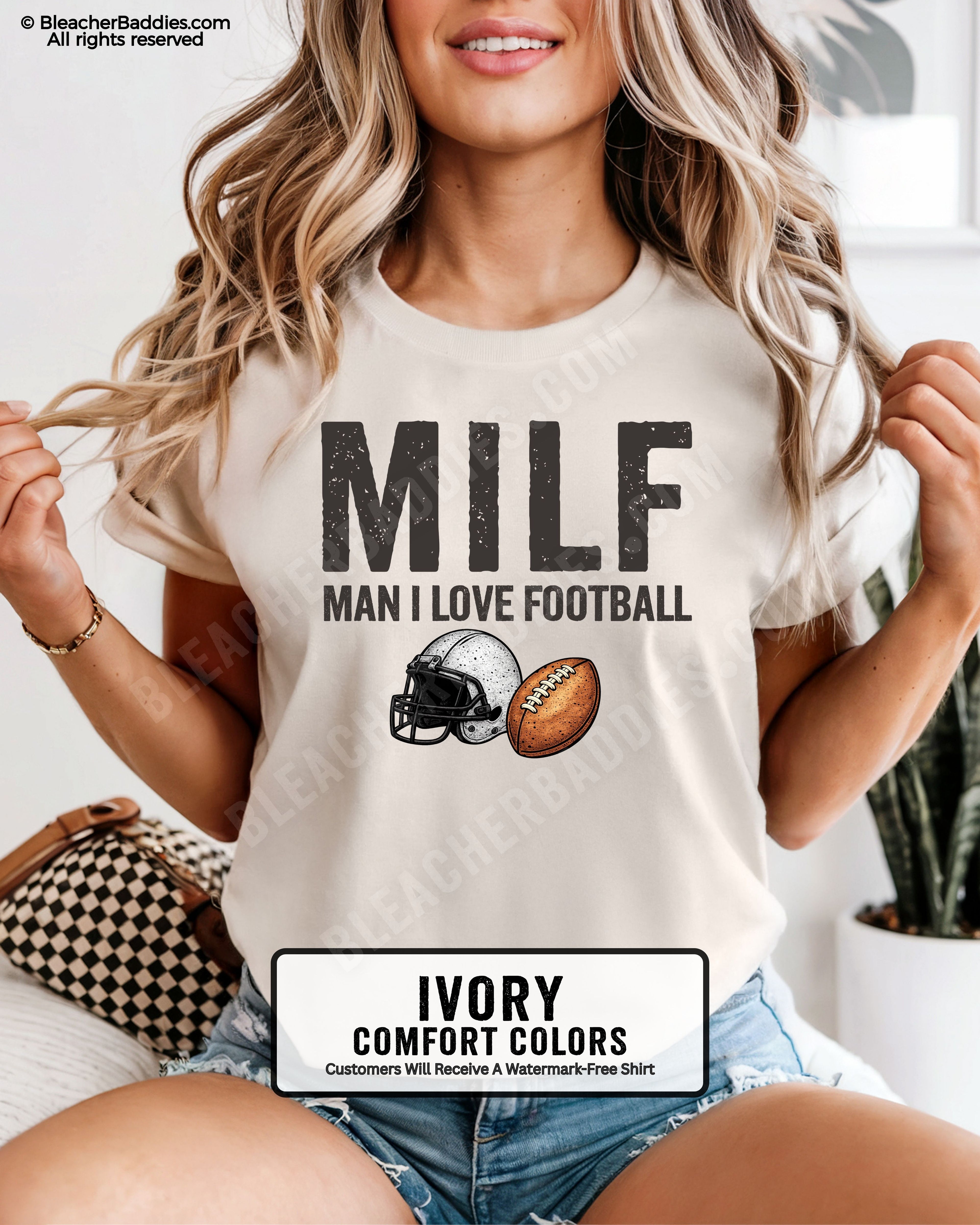 Woman wearing ivory comfort colors t-shirt that says “MILF Man I Love Football” with football helmet and ball graphic