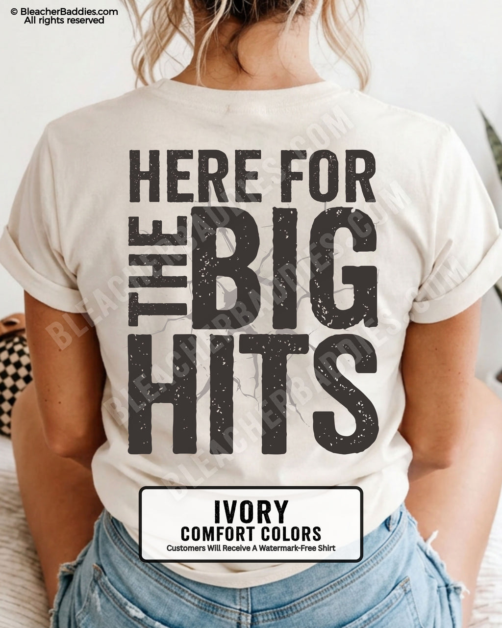 Ivory Comfort Colors baseball mom graphic tee with oversized distressed typography reading “Here For The Big Hits” across the back