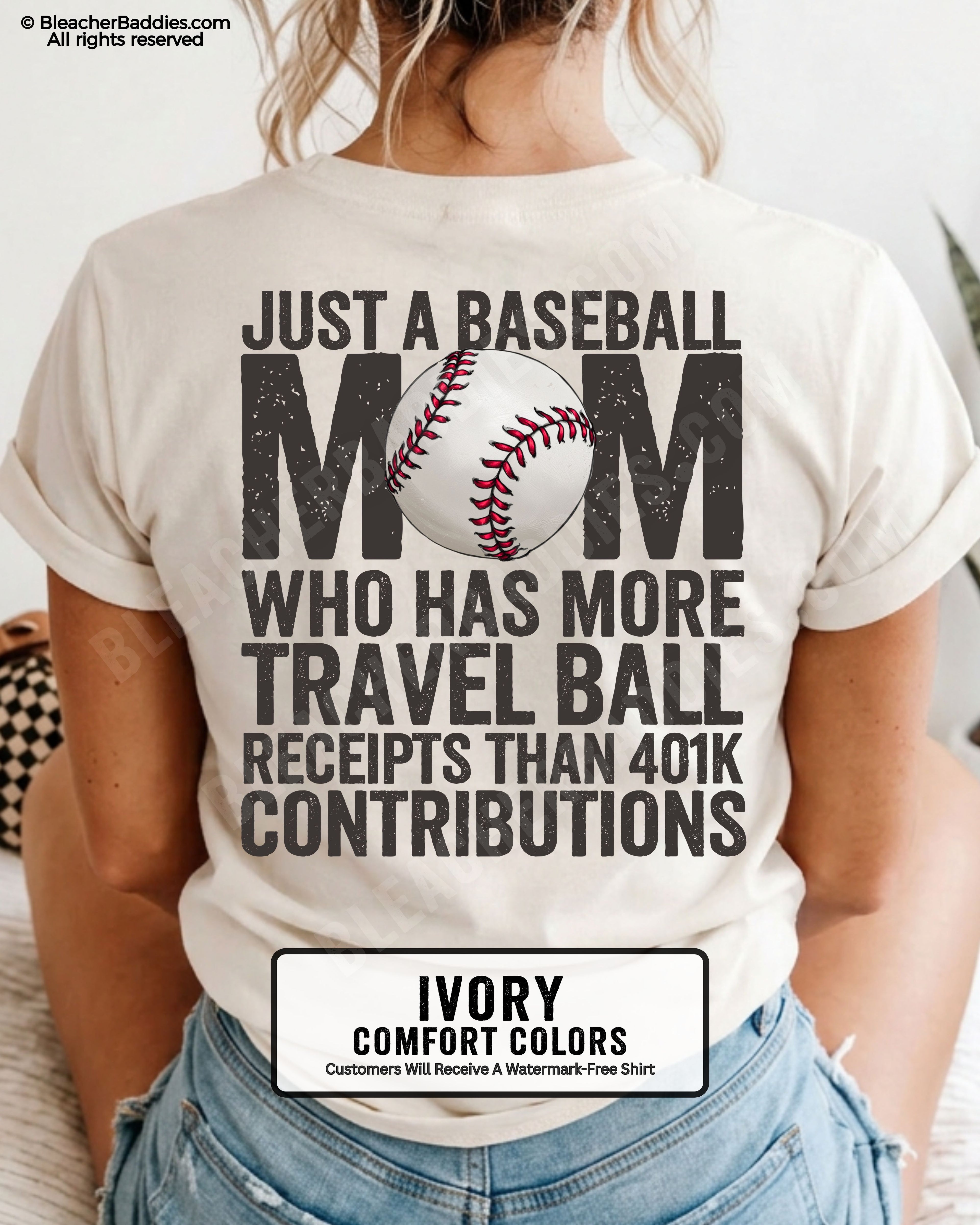 Ivory baseball mom graphic tee featuring distressed black back design reading “Just a baseball mom who has more travel ball receipts than 401k contributions” with baseball illustration centered in MOM