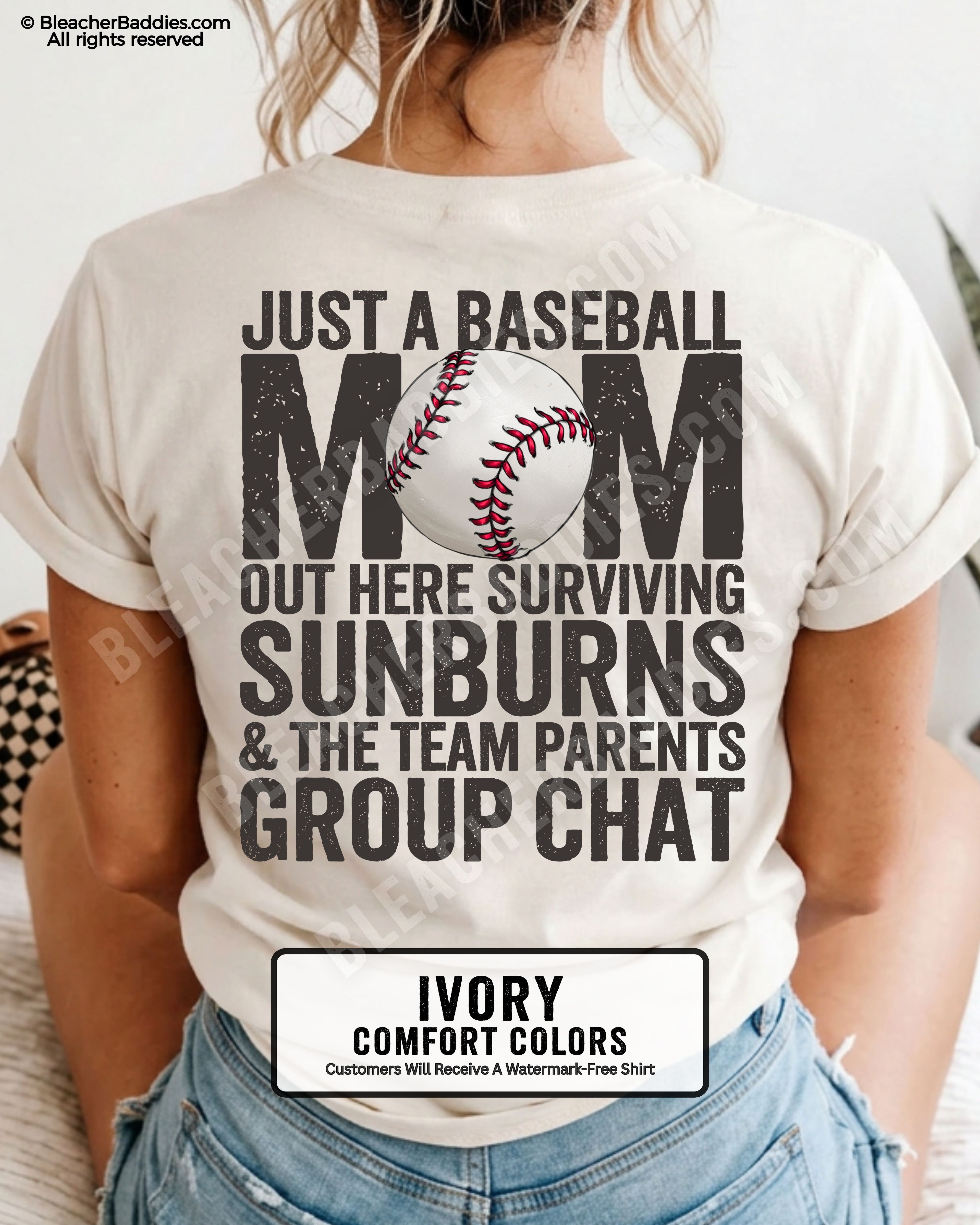 Ivory Comfort Colors game day shirt worn by woman showing distressed back graphic reading “Just a Baseball Mom Out Here Surviving Sunburns & The Team Parents Group Chat” with baseball illustration layered over MOM text