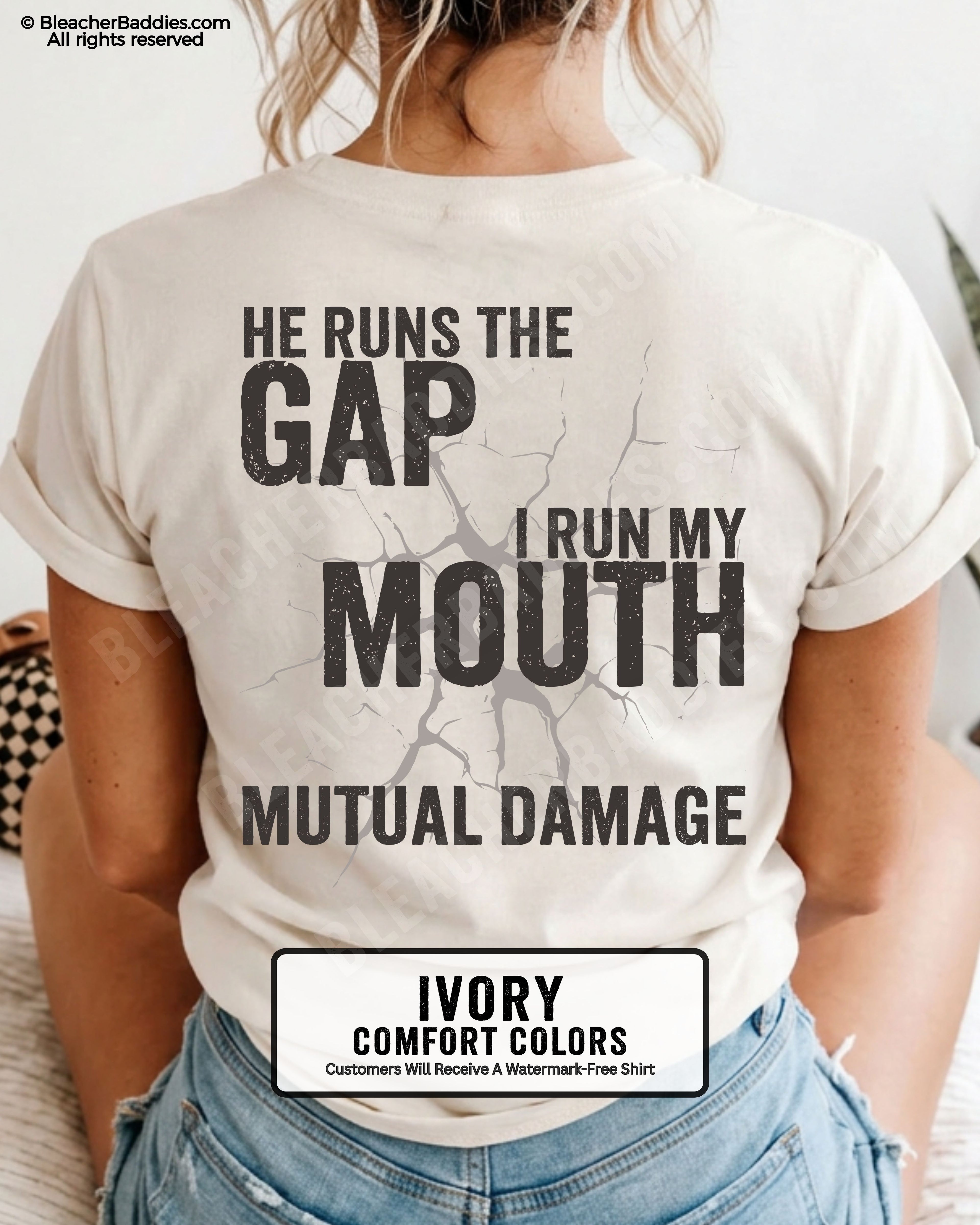 Back view of football mom wearing ivory Comfort Colors game day shirt with “He Runs the Gap I Run My Mouth Mutual Damage” graphic design