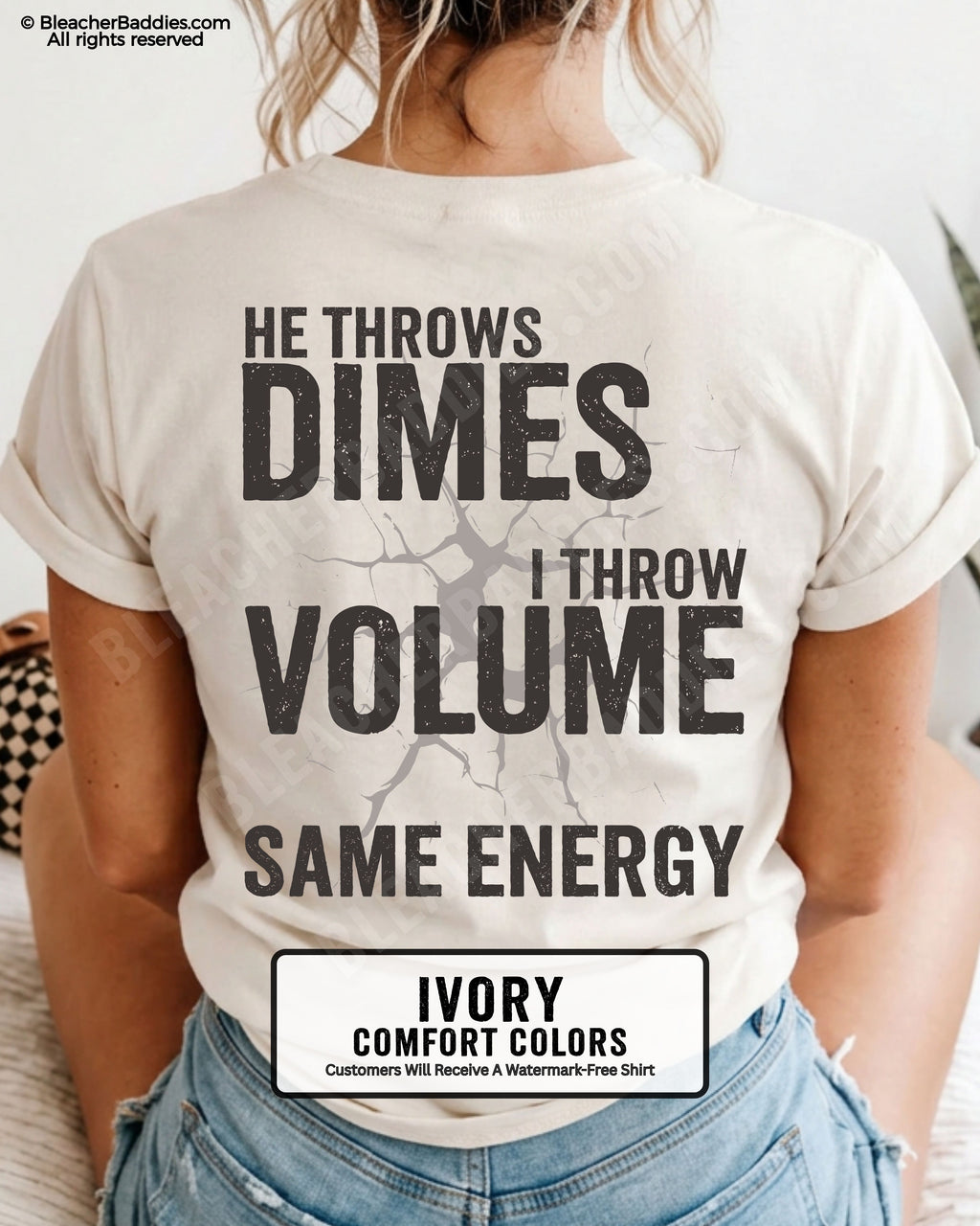 Back view of woman wearing ivory Comfort Colors t-shirt mockup showing large distressed text “He Throws Dimes I Throw Volume Same Energy” centered on the back design