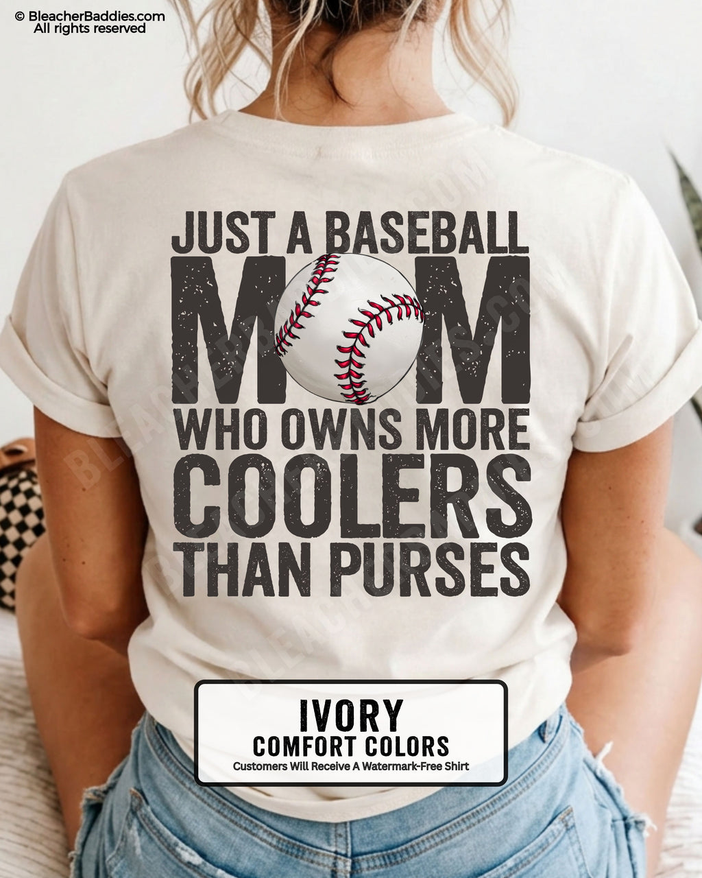 Ivory Comfort Colors baseball mom shirt with bold distressed back graphic reading “Just a baseball mom who owns more coolers than purses” and baseball illustration centered in the word MOM