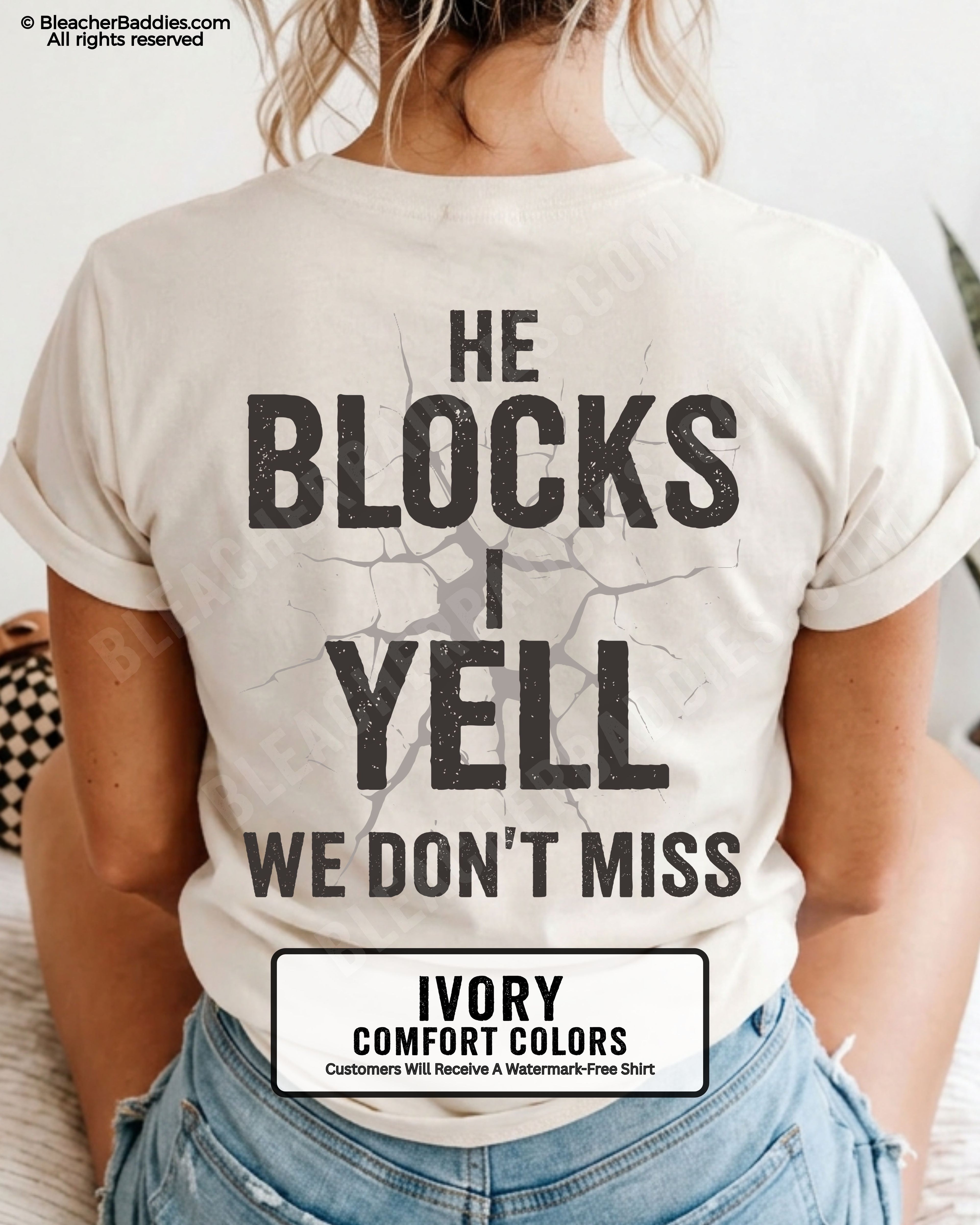 Woman wearing ivory Comfort Colors football mom game day shirt with back design that reads “He blocks I yell we don’t miss” in distressed black text with cracked graphic and ivory color label shown