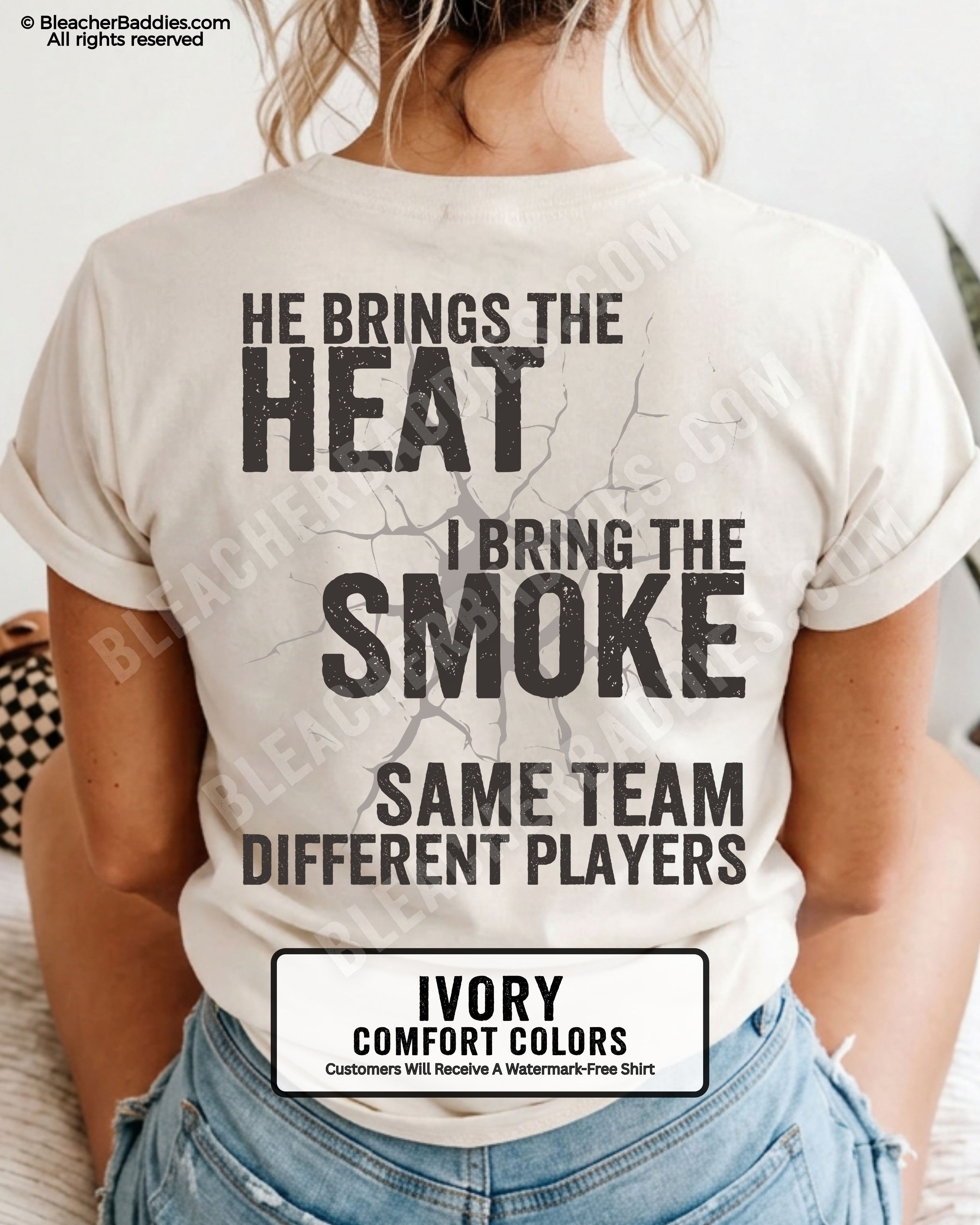 Woman wearing IVORY Comfort Colors shirt with distressed text reading “He Brings The Heat I Bring The Smoke Same Team Different Players.”