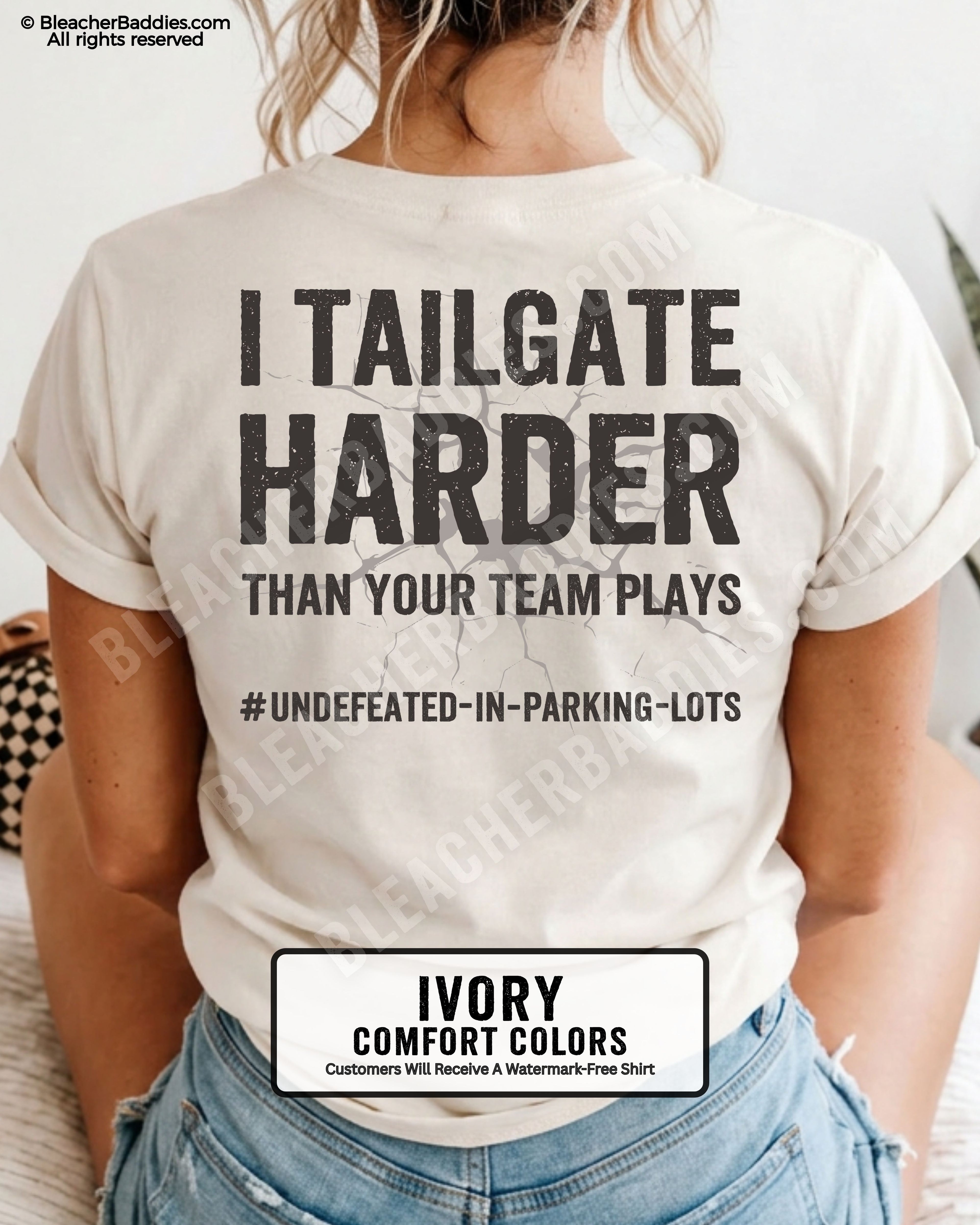 Ivory Comfort Colors baseball mom graphic tee with distressed oversized lettering reading “I Tailgate Harder Than Your Team Plays” with hashtag “#Undefeated-In-Parking-Lots” across the back
