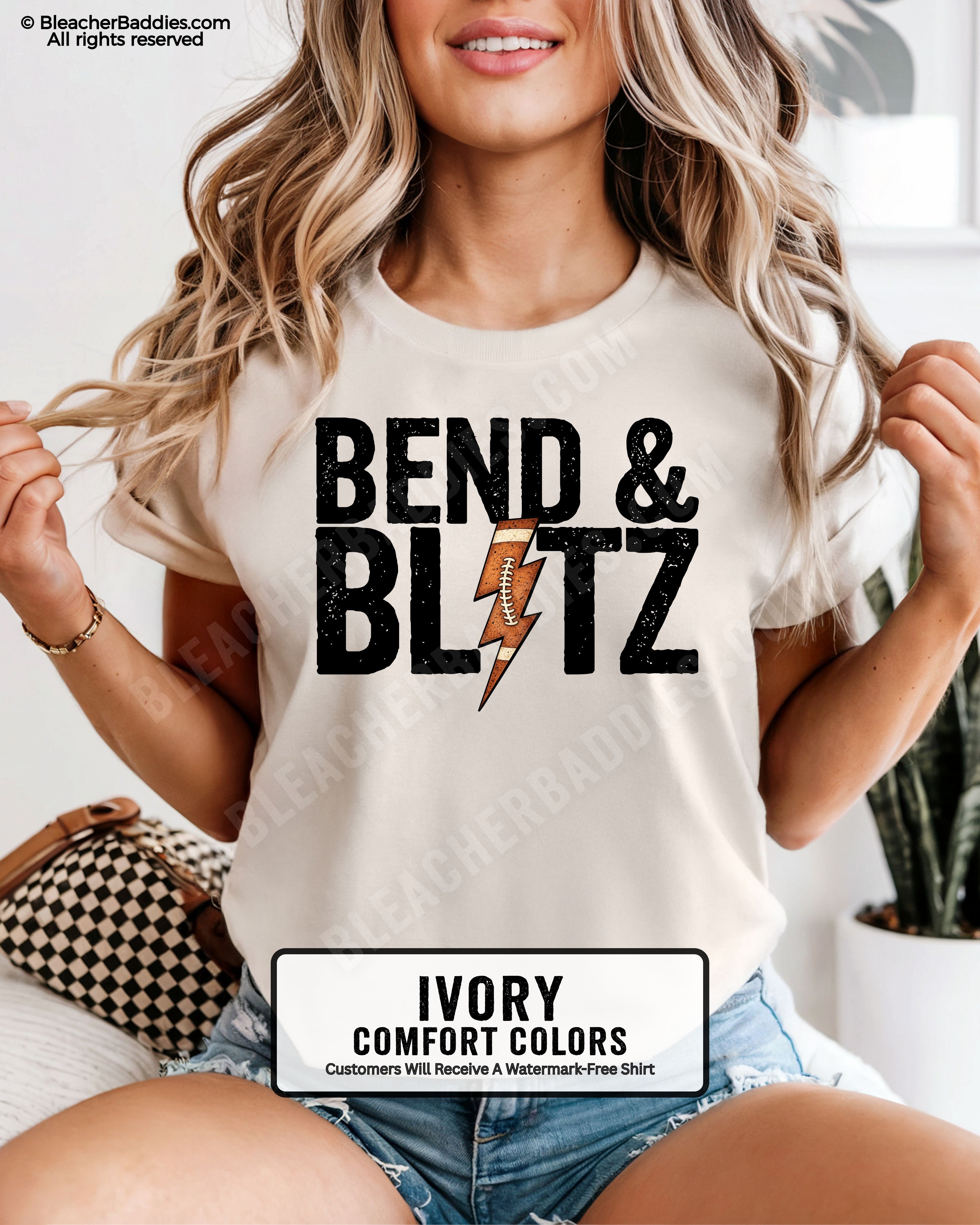 Front view of an ivory Comfort Colors t-shirt featuring the phrase "Bend & Blitz" in bold distressed lettering with a textured football lightning bolt graphic replacing the letter "I" for a trendy football game day design.