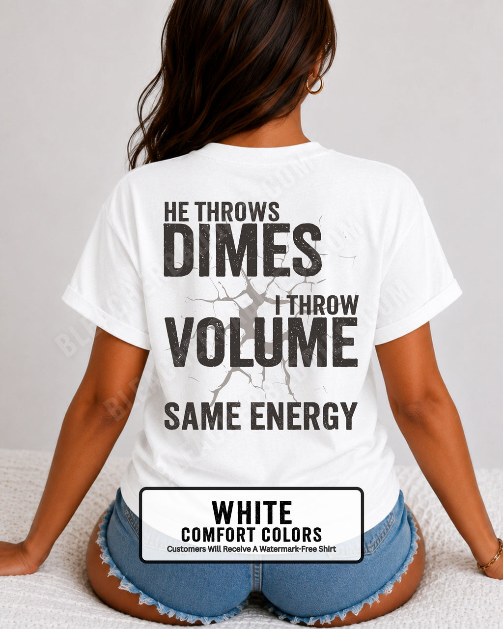 Back view of woman wearing white Comfort Colors t-shirt mockup showing large distressed text “He Throws Dimes I Throw Volume Same Energy” centered on the back design. Quarterback mom shirt. Football mom shirt.