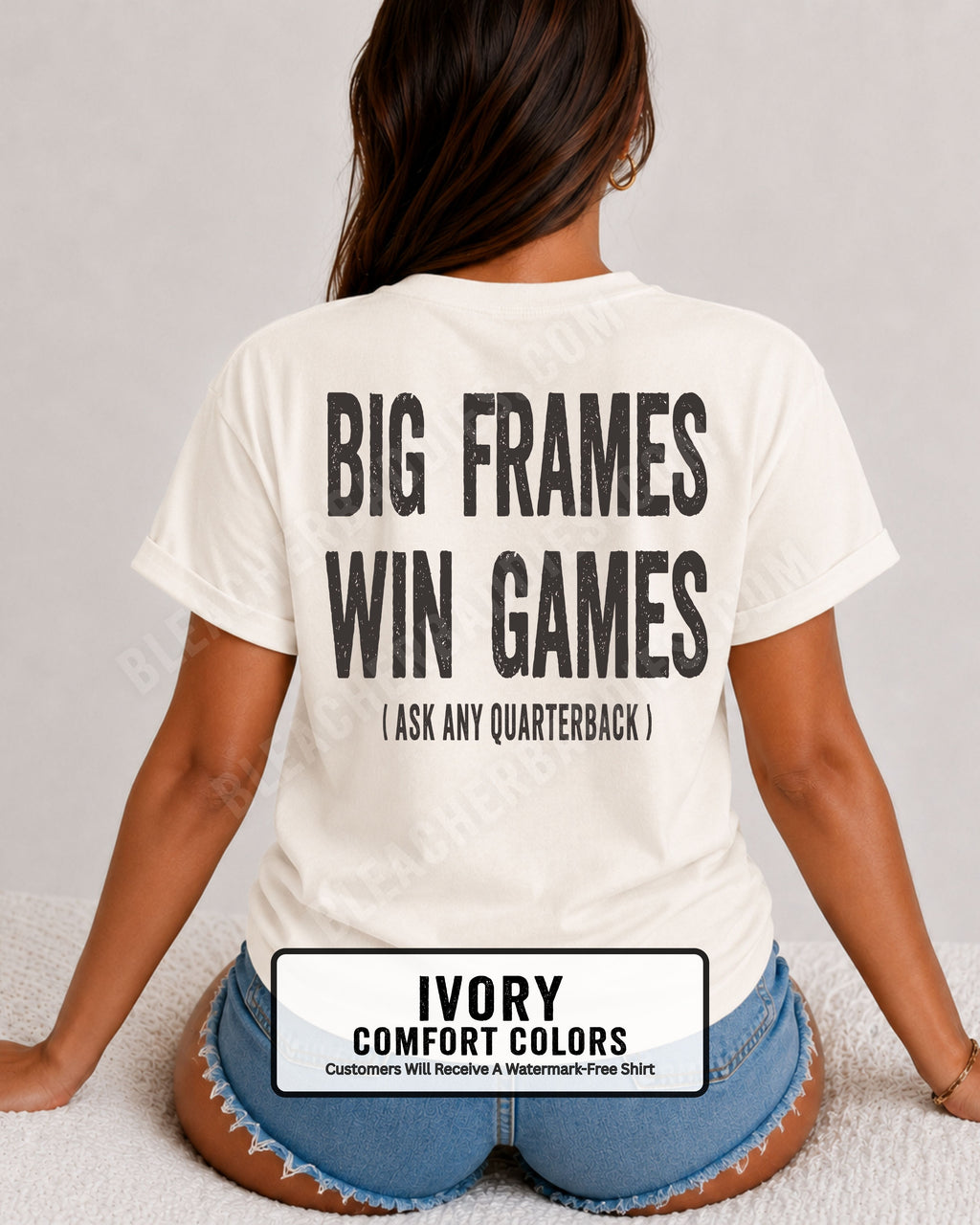 woman wearing an ivory comfort colors tee with a  back graphic that reads, "BIG FRAMES WIN GAMES (ASK ANY QUARTERBACK)," showcasing a funny football text design for offensive line fans and linemen.