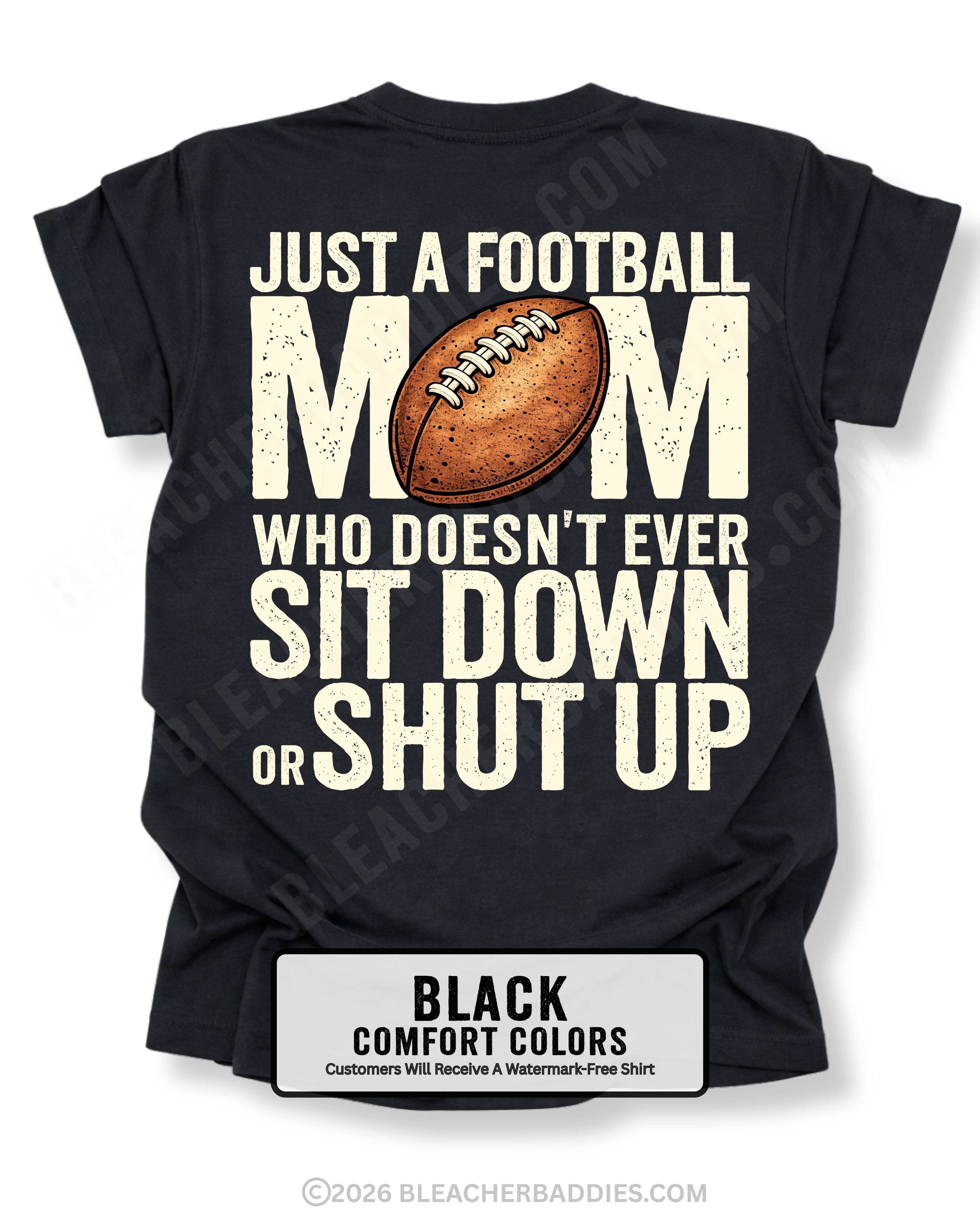 Black Comfort Colors t-shirt shown from back with oversized graphic text “Just a Football Mom Who Doesn’t Ever Sit Down or Shut Up” and football illustration