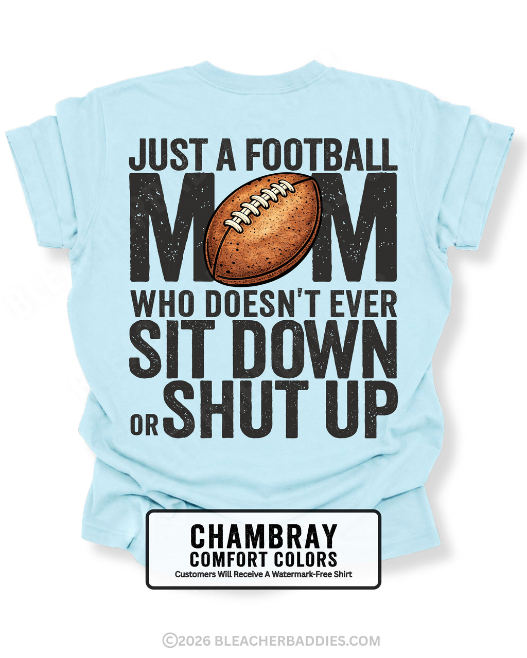 Chambray Comfort Colors t-shirt shown from back with oversized graphic text “Just a Football Mom Who Doesn’t Ever Sit Down or Shut Up” and football illustration