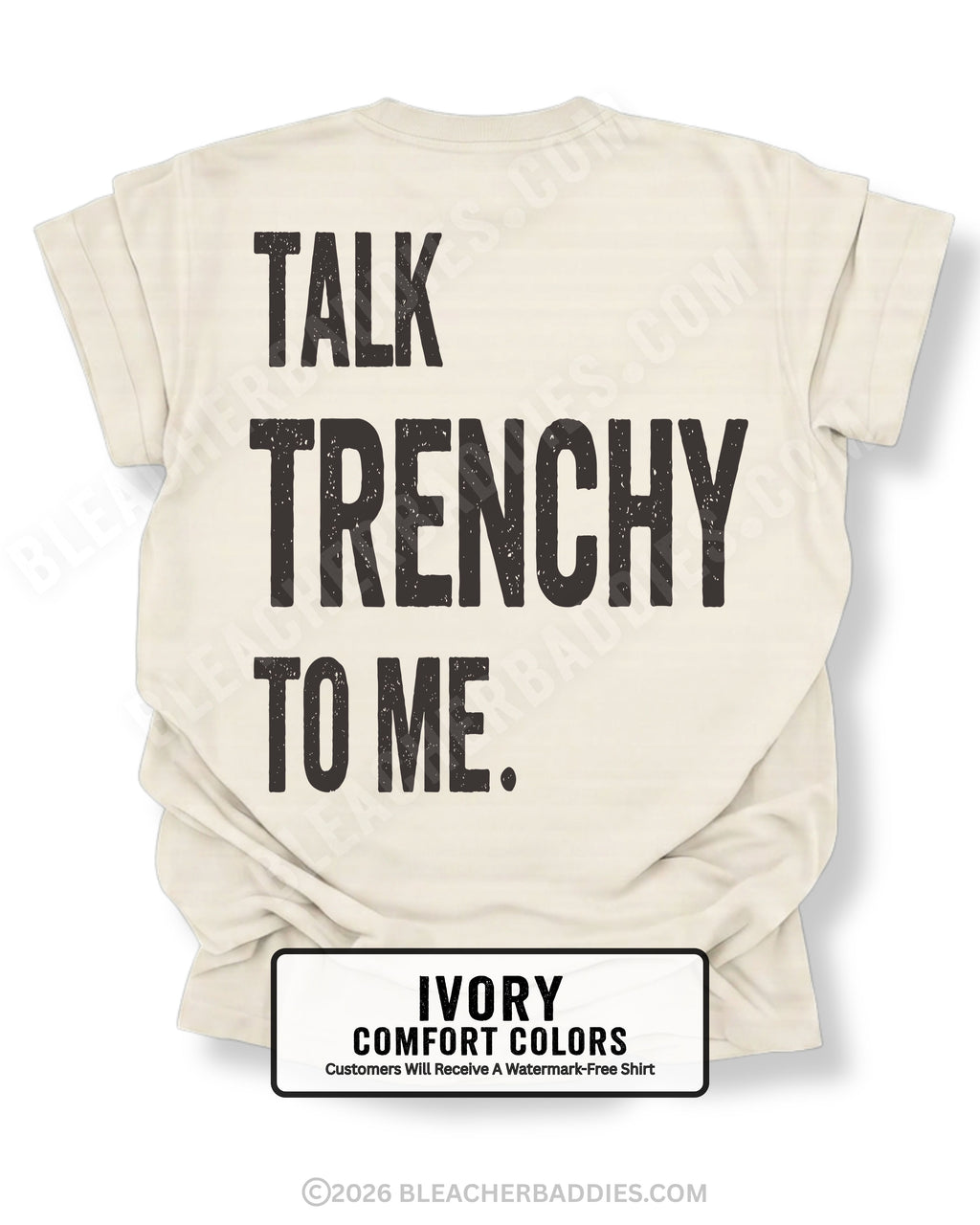 Ivory Comfort Colors T-shirt featuring the funny football back design "Talk Trenchy to Me" in distressed black lettering. Flat lay mockup showcasing a humorous offensive line fan shirt perfect for football moms, dads, tailgates, Friday night lights, and game day.