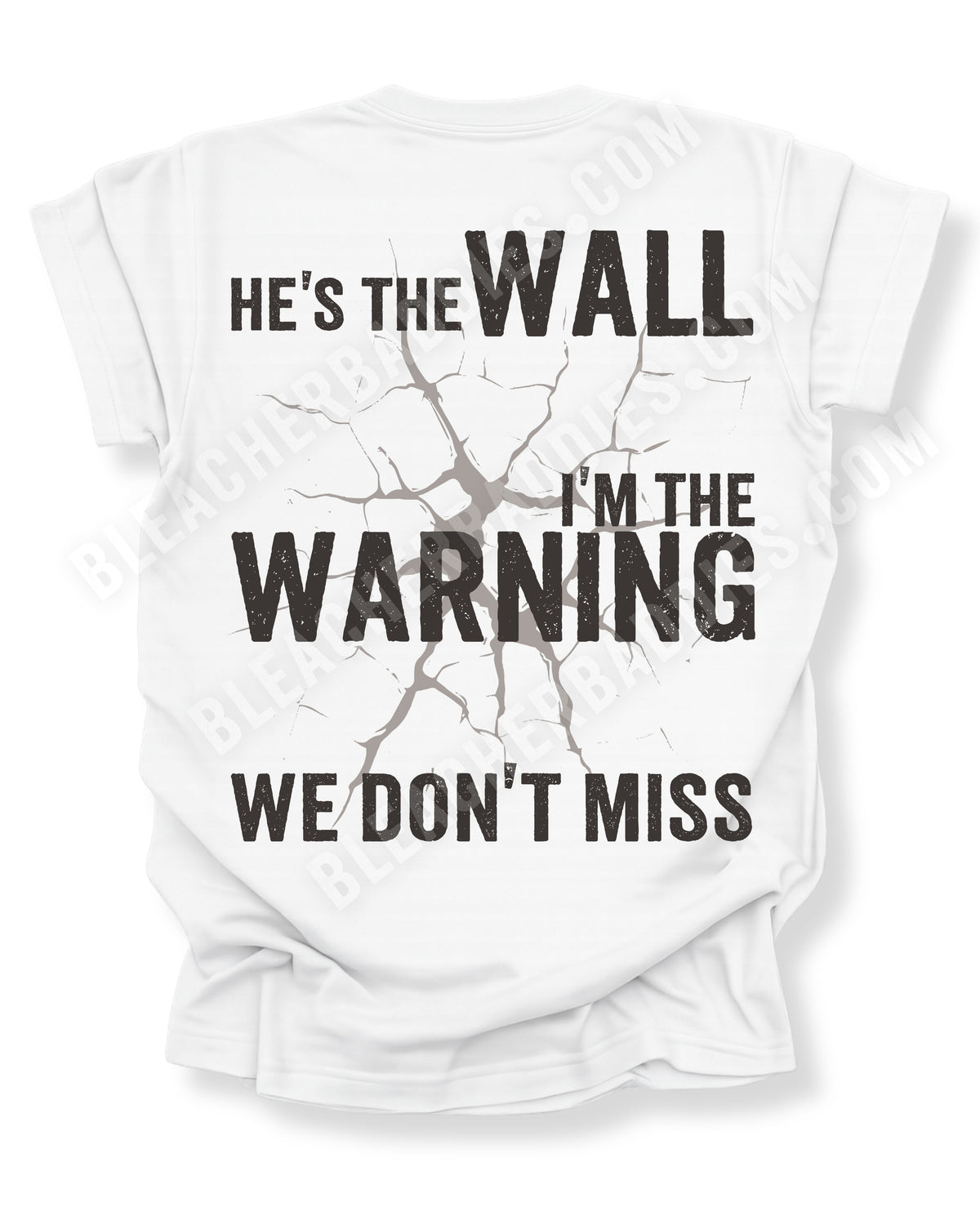 White football mom game day shirt shown from the back featuring a large distressed black graphic that reads “He’s the Wall I’m the Warning We Don’t Miss.” Offensive Lineman Mom Shirt. Defensive Lineman Mom Shirt. Football Mom Shirt.