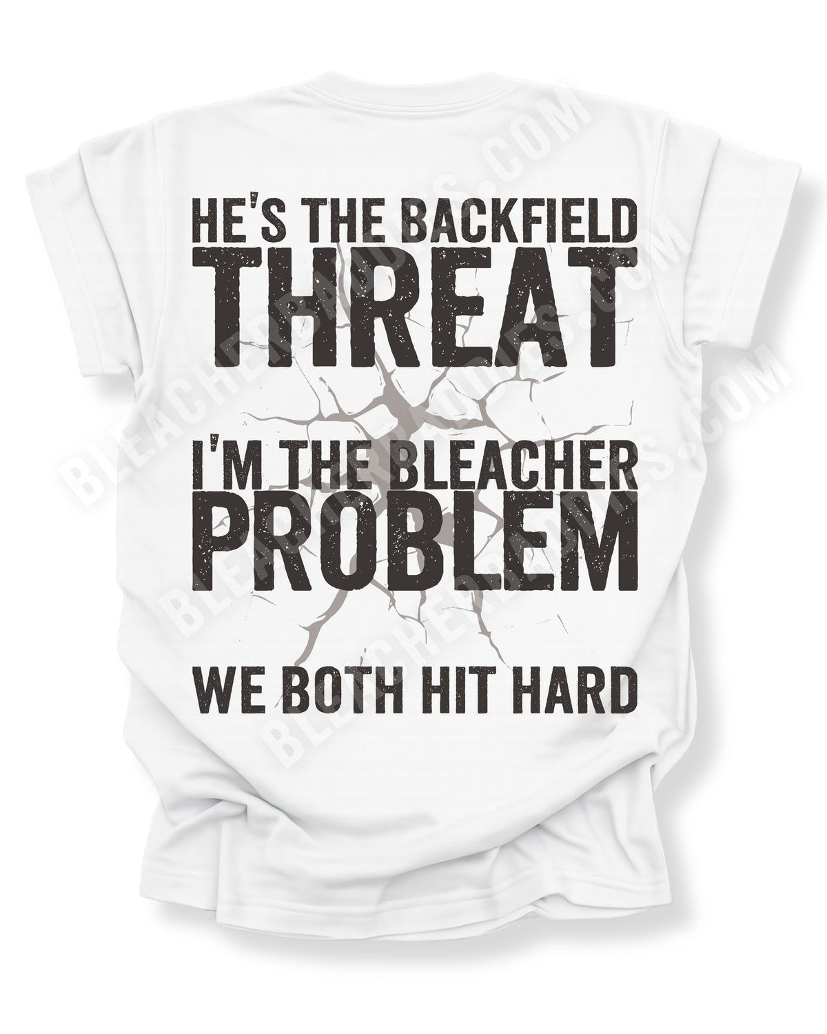 Back view of white Comfort Colors football mom game day shirt featuring “He’s the Backfield Threat I’m the Bleacher Problem We Both Hit Hard” bold graphic design. Linebacker mom shirt. Defensive Lineman Mom Shirt. Football mom shirt.