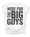 White football lineman mom game day shirt with bold distressed black text reading “Here for the big guys” with cracked graphic behind the lettering. Offensive Lineman Mom Shirt. Defensive Lineman Mom Shirt. Football Mom Shirt.