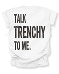 White Comfort Colors football fan T-shirt with the bold distressed back graphic "Talk Trenchy to Me." Funny offensive line-inspired apparel for football fans, linemen supporters, tailgates, high school football games, and stadium weekends.