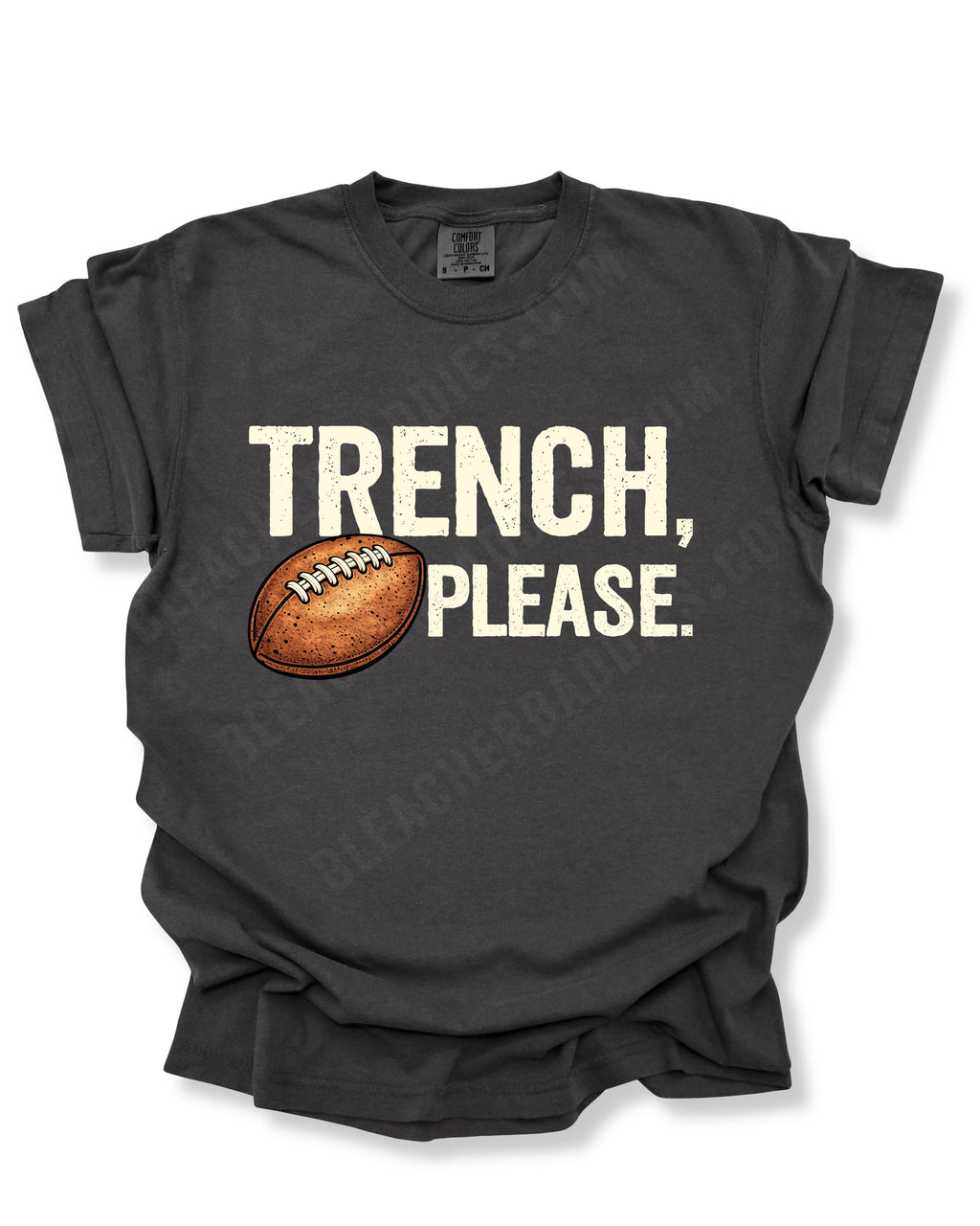 Flat lay mockup of a pepper Comfort Colors t-shirt featuring the funny football saying "Trench, Please." in distressed cream lettering with a vintage football graphic. A humorous game day shirt for football fans, offensive line supporters, linemen, coaches, football moms, and anyone who knows the trenches are where games are won.