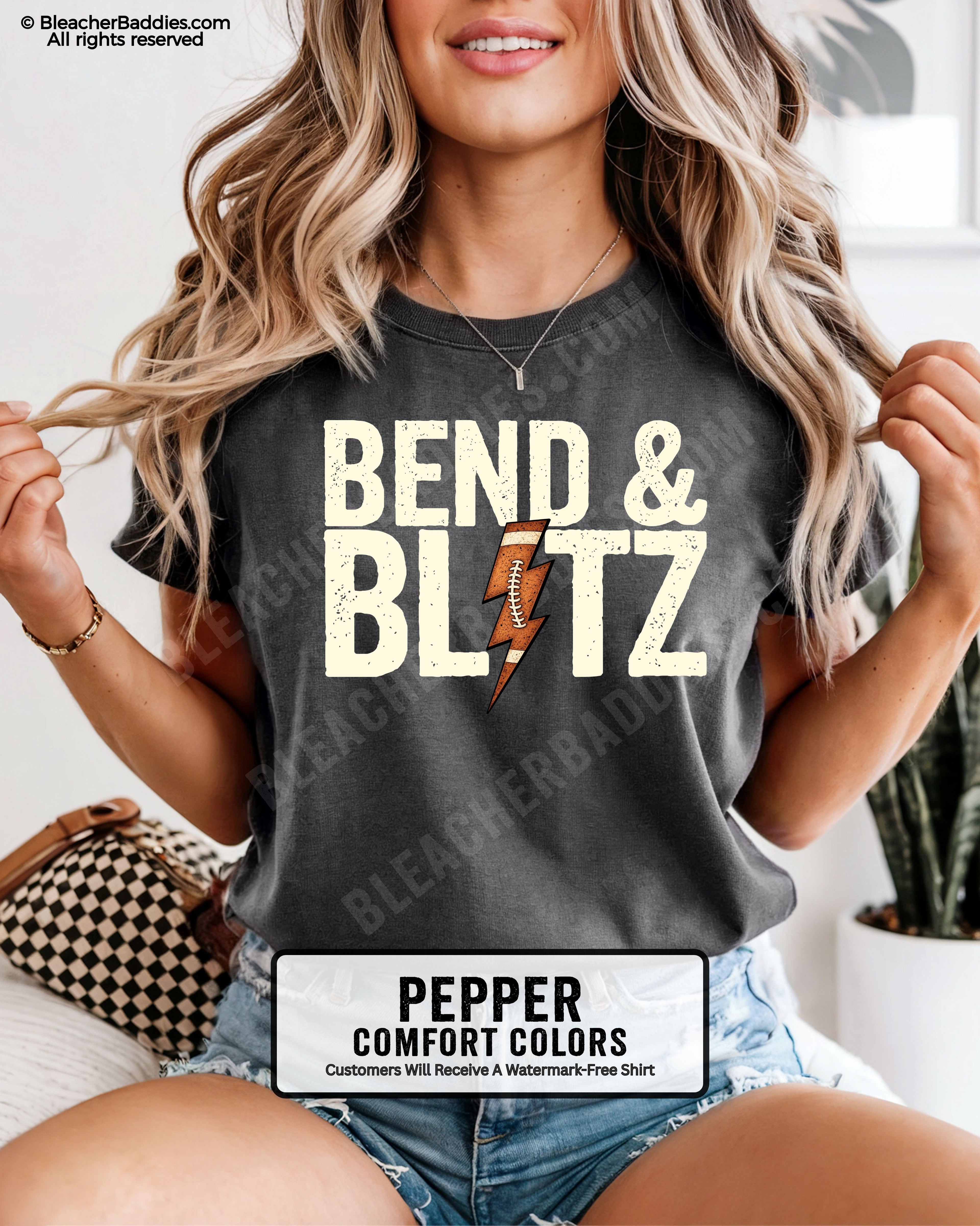 Front view of a pepper Comfort Colors t-shirt featuring the phrase "Bend & Blitz" in bold distressed lettering with a textured football lightning bolt graphic replacing the letter "I" for a trendy football game day design.
