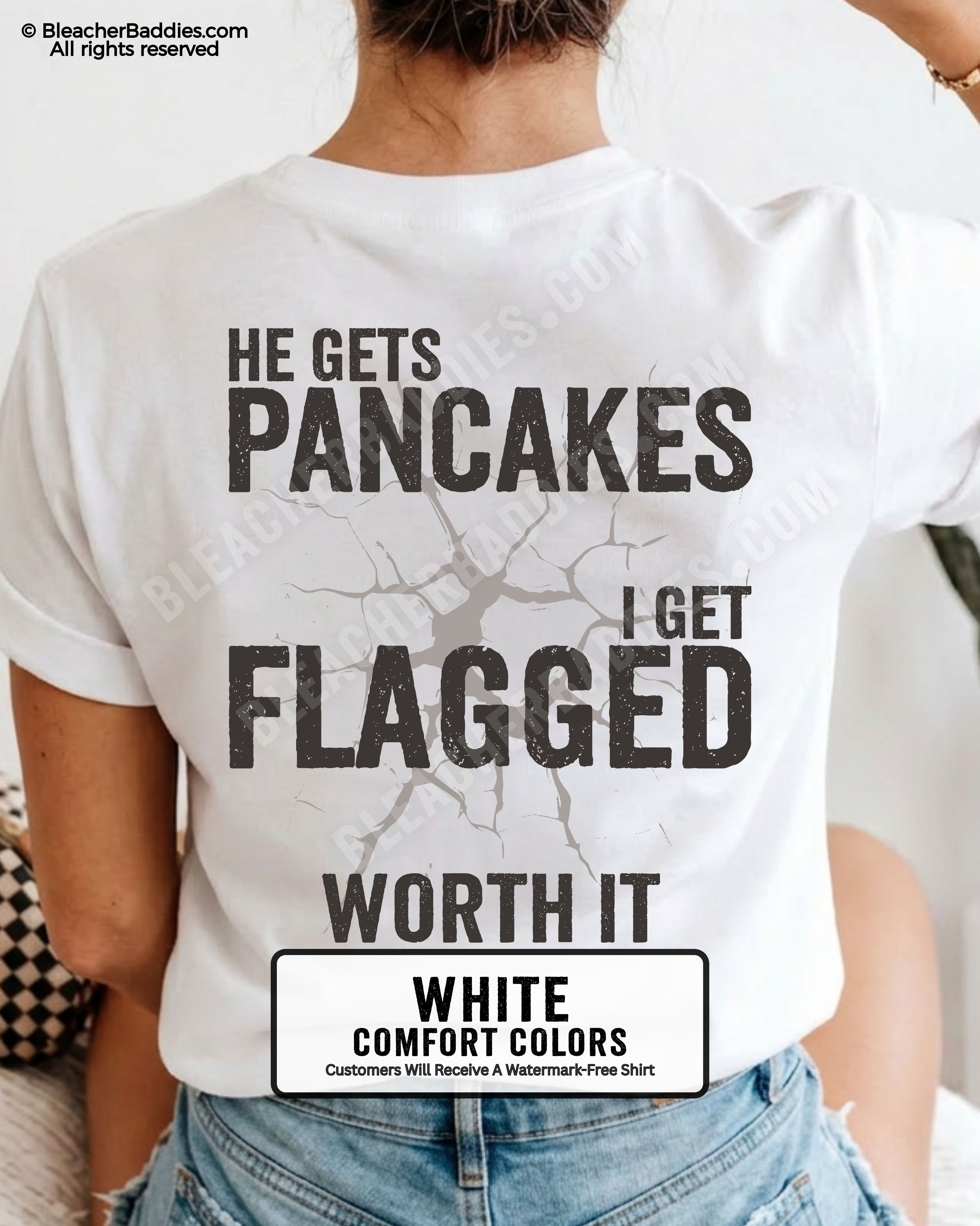 Football mom game day shirt in WHITE with back design that reads “He gets pancakes I get flagged worth it” in distressed black text with cracked graphic