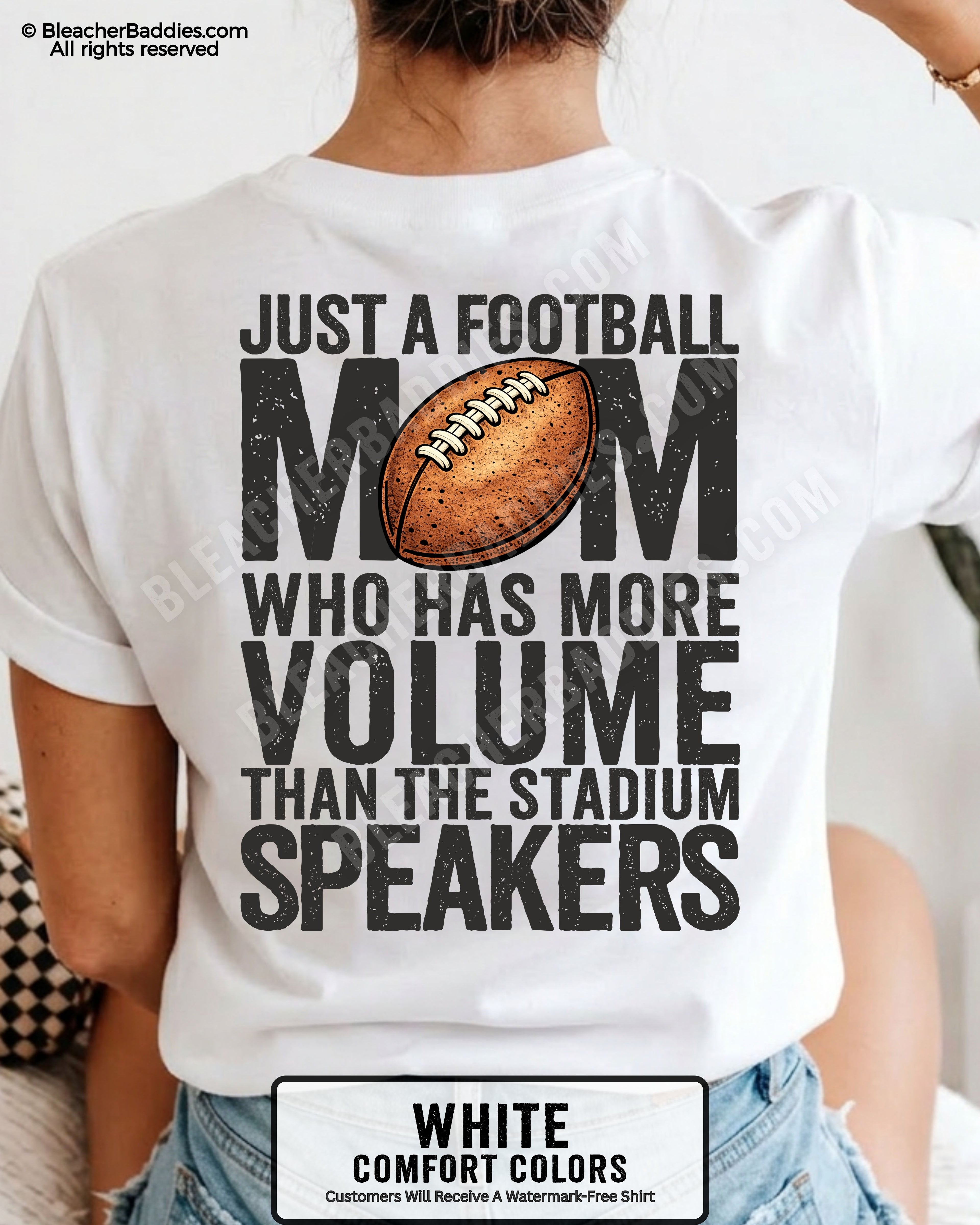 White Comfort Colors t-shirt worn by woman showing back graphic reading “Just a football mom who has more volume than the stadium speakers” with football illustration